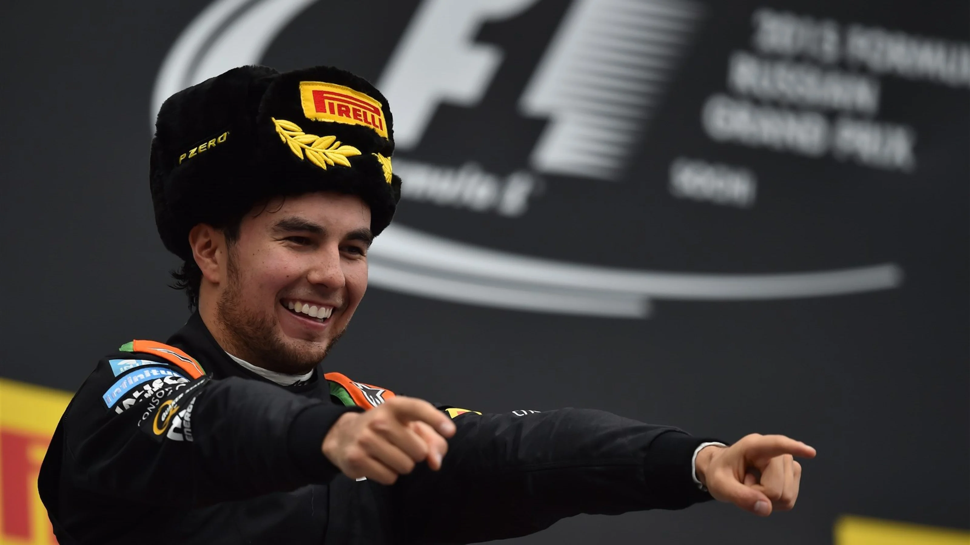 Sergio Perez (MEX) Force India celebrates on the podium at Formula One World Championship, Rd15,
