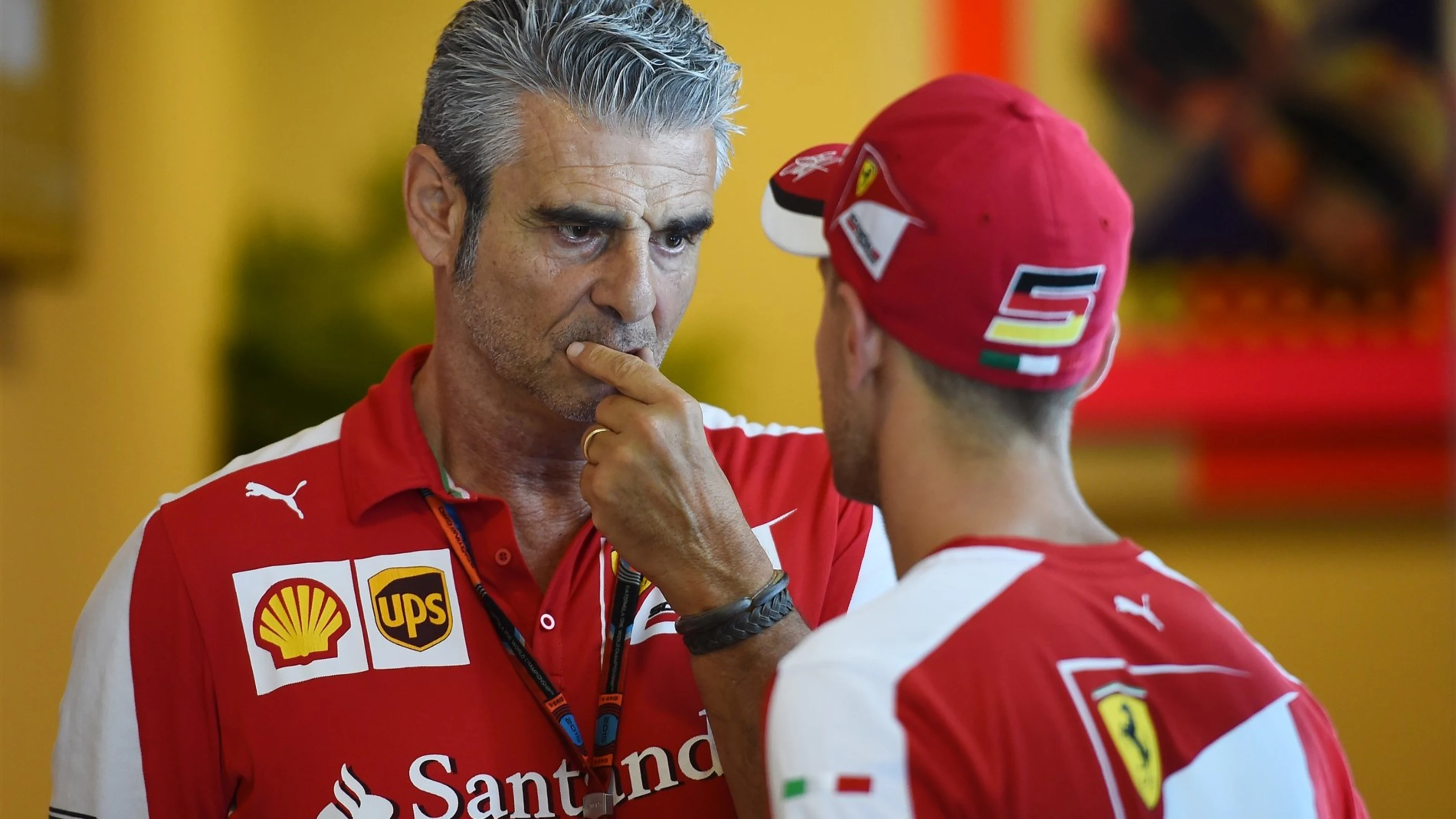 Maurizio Arrivabene (ITA) Ferrari Team Principal and Sebastian Vettel (GER) Ferrari at Formula One
