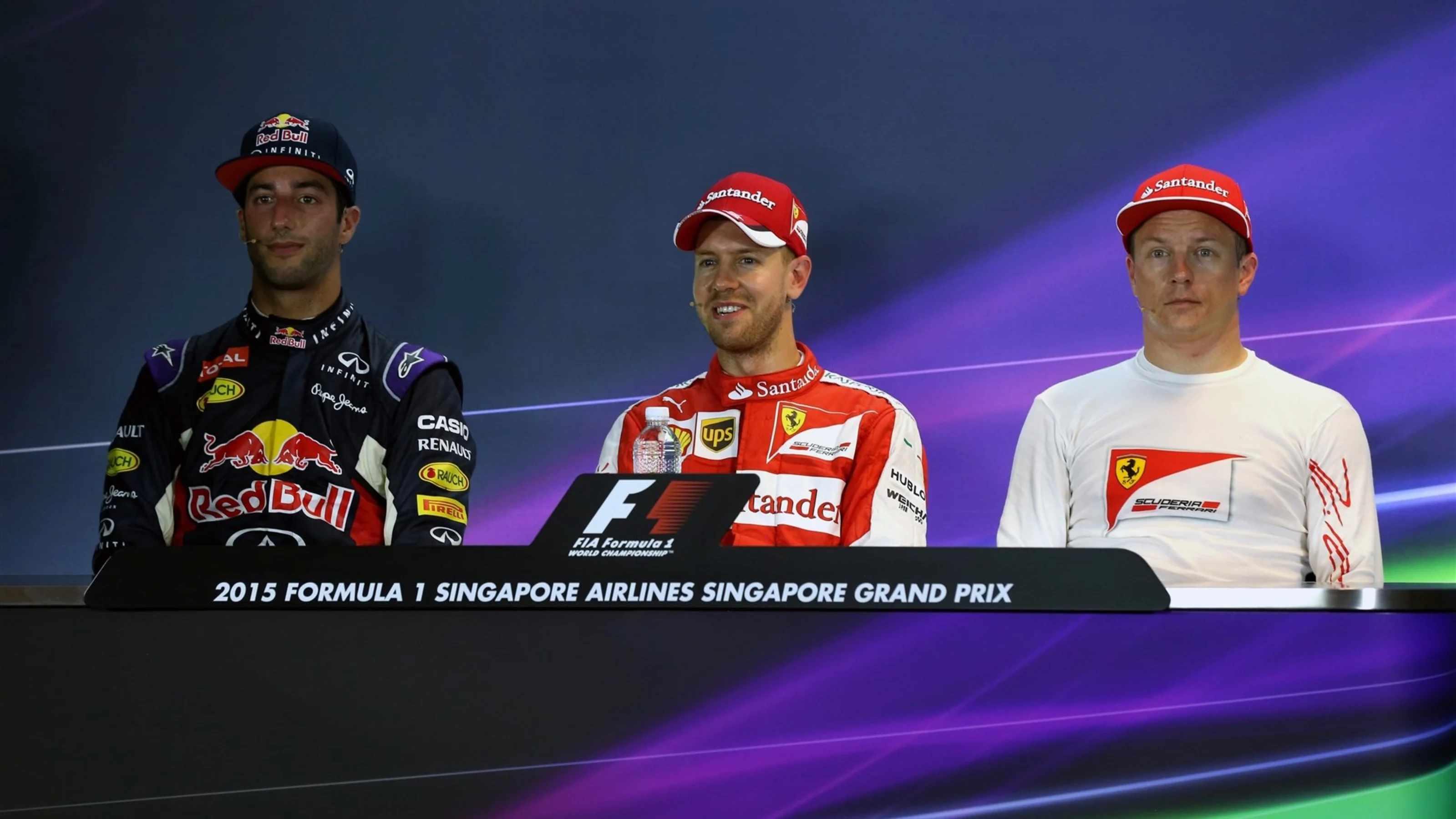 (L to R): Daniel Ricciardo (AUS) Red Bull Racing, pole sitter Sebastian Vettel (GER) Ferrari and