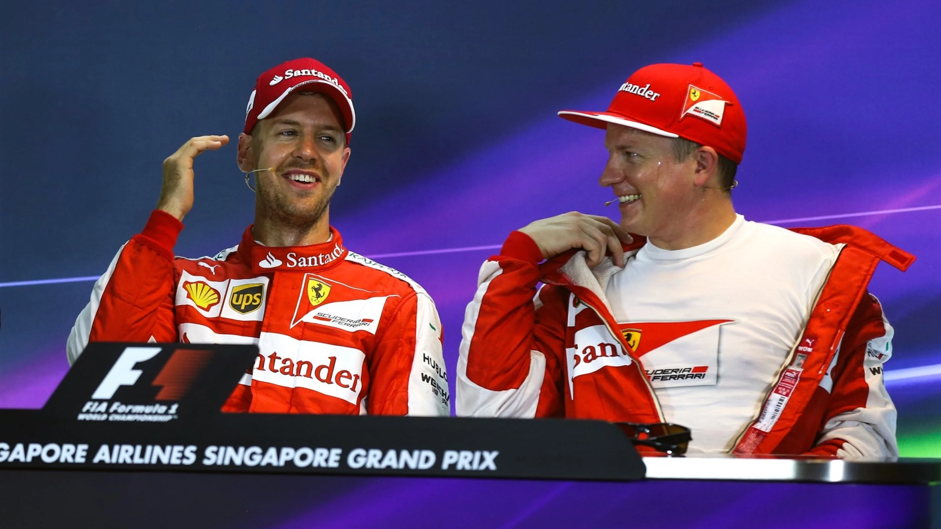 Pole sitter Sebastian Vettel (GER) Ferrari and Kimi Raikkonen (FIN) Ferrari in the press conference