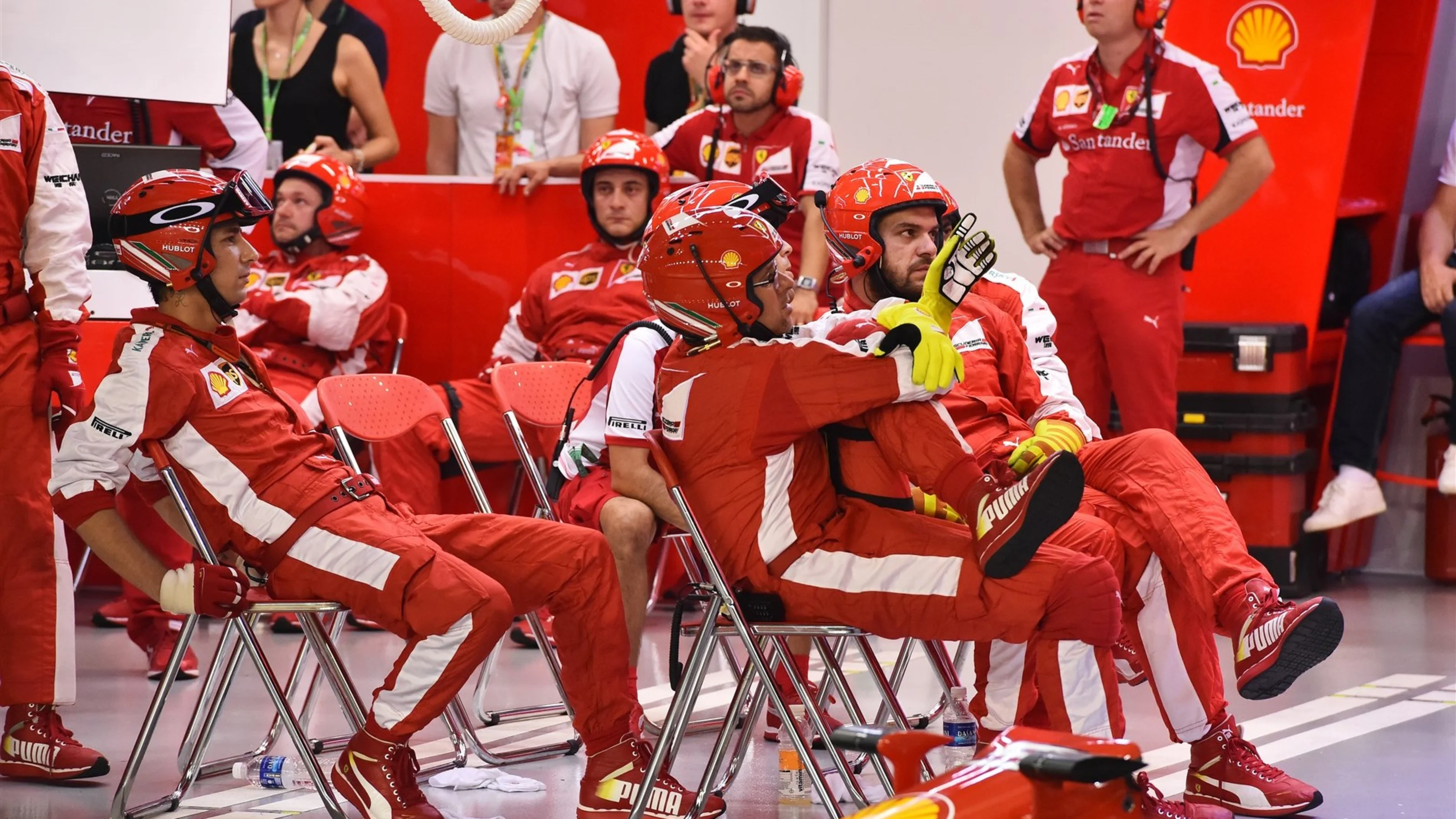 Ferrari mechanics in the garage at Formula One World Championship, Rd13, Singapore Grand Prix,