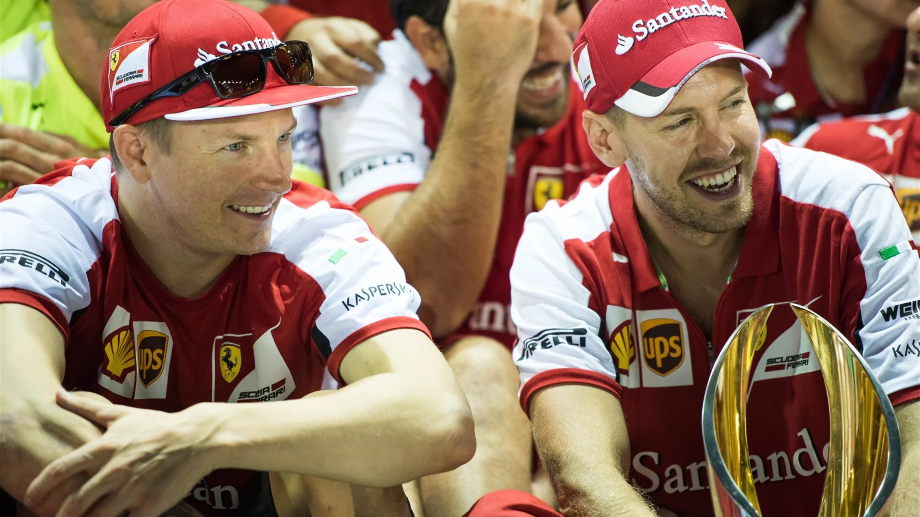 Kimi Raikkonen (FIN) Ferrari and race winner Sebastian Vettel (GER) Ferrari celebrate with the