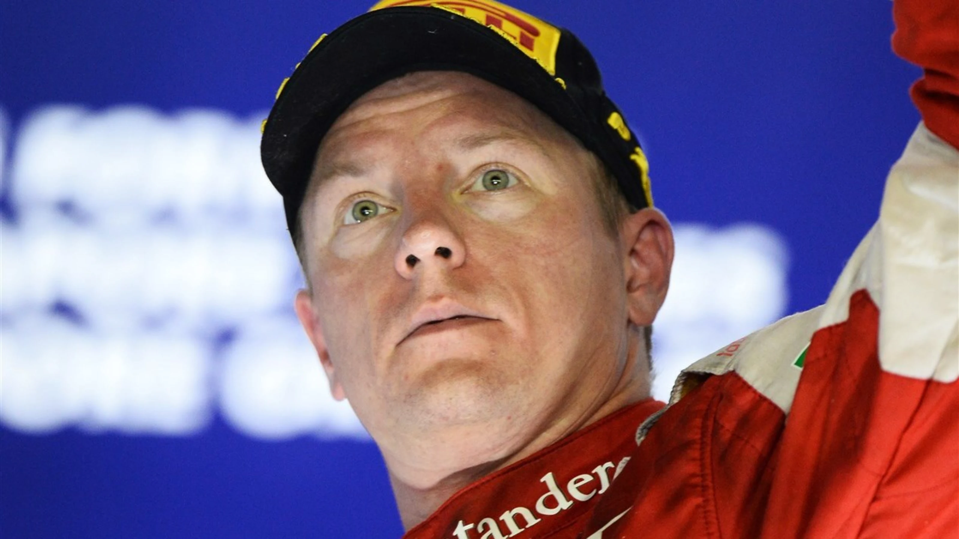 Kimi Raikkonen (FIN) Ferrari Celebrates on the podium at Formula One World Championship, Rd13,
