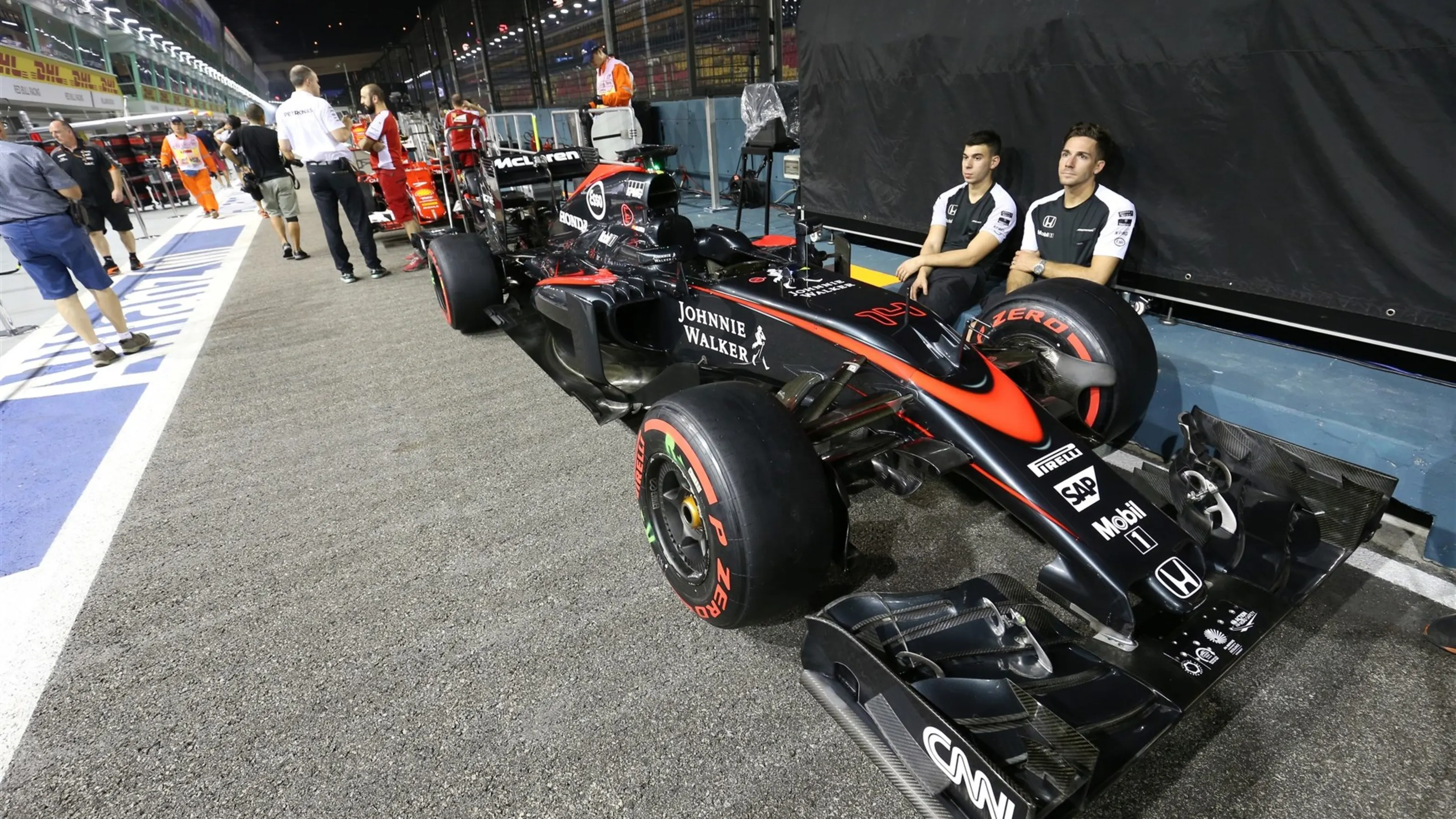 McLaren MP4-30 and team mechanics at Formula One World Championship, Rd13, Singapore Grand Prix,