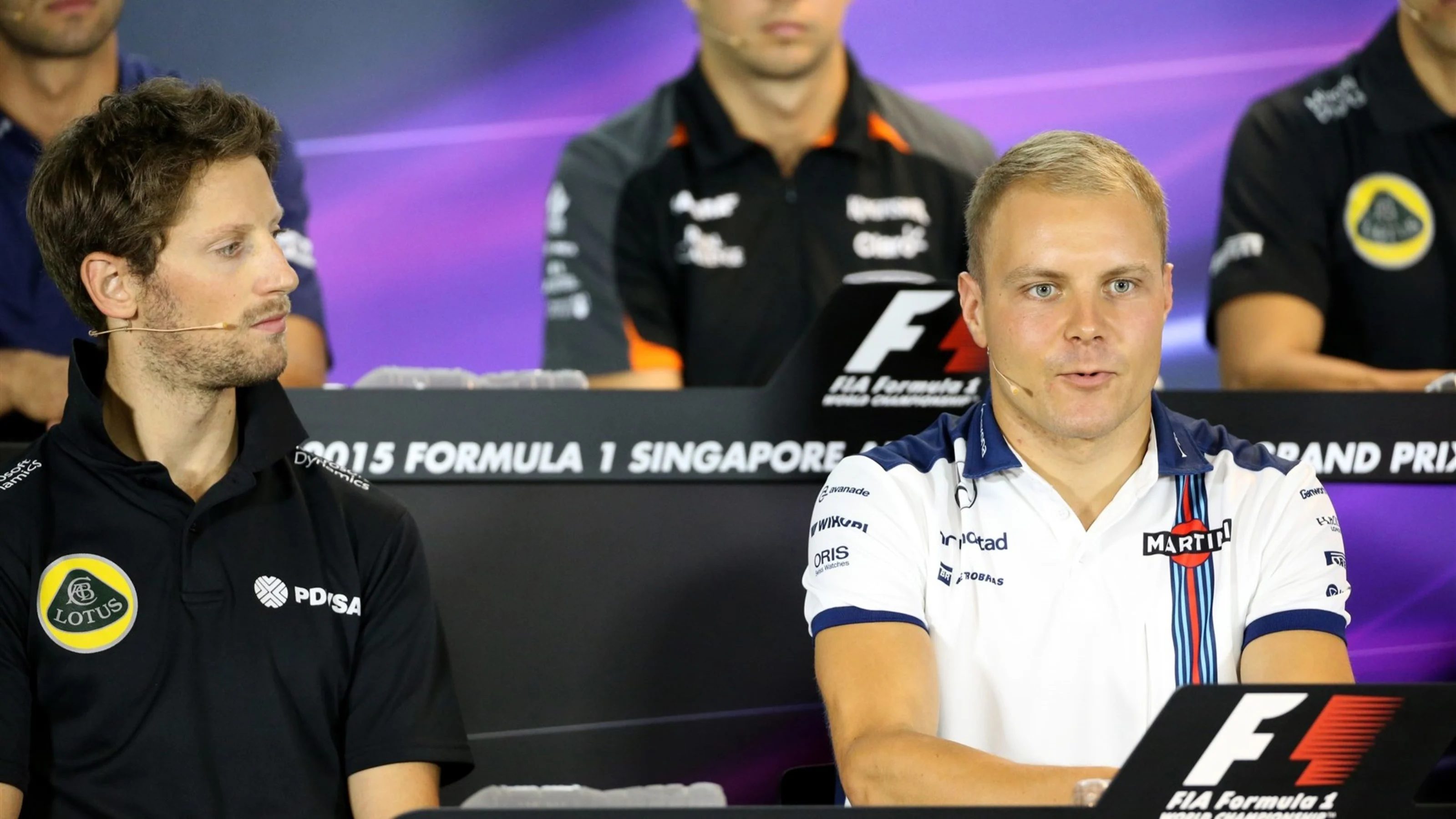 Romain Grosjean (FRA) Lotus F1 and Valtteri Bottas (FIN) Williams in the press conference at