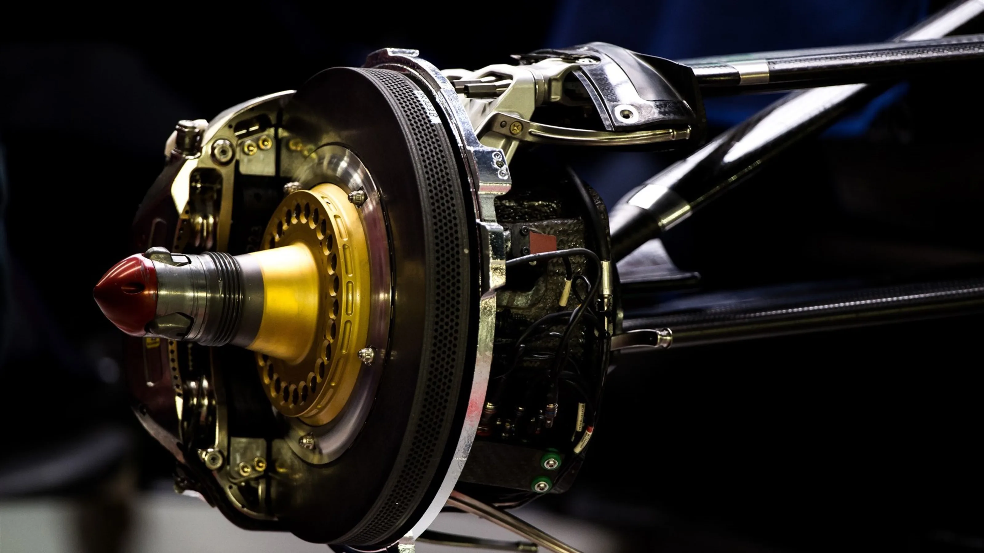 Scuderia Toro Rosso STR10 front brake and wheel hub detail at Formula One World Championship, Rd13,