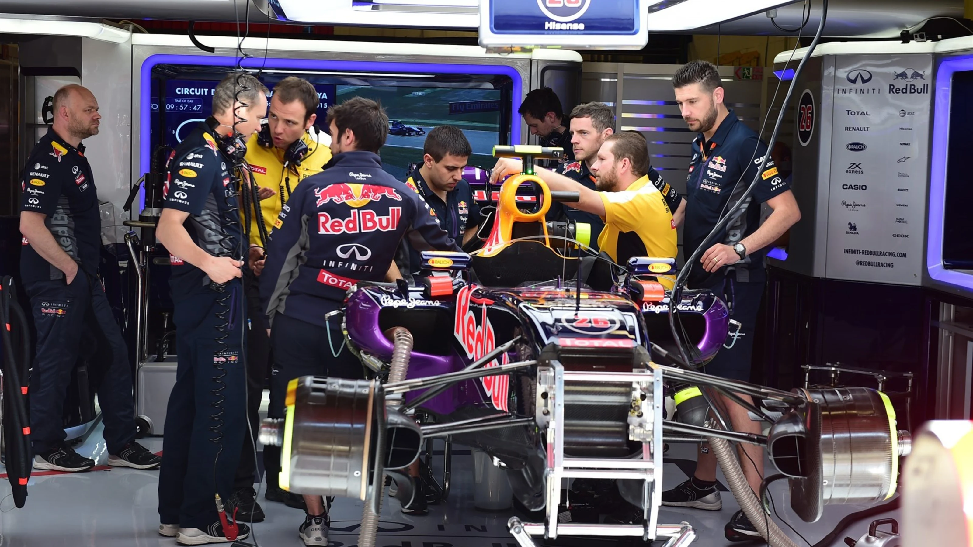 The car of Daniil Kvyat (RUS) Red Bull Racing RB11 is worked on in the garage at Formula One World