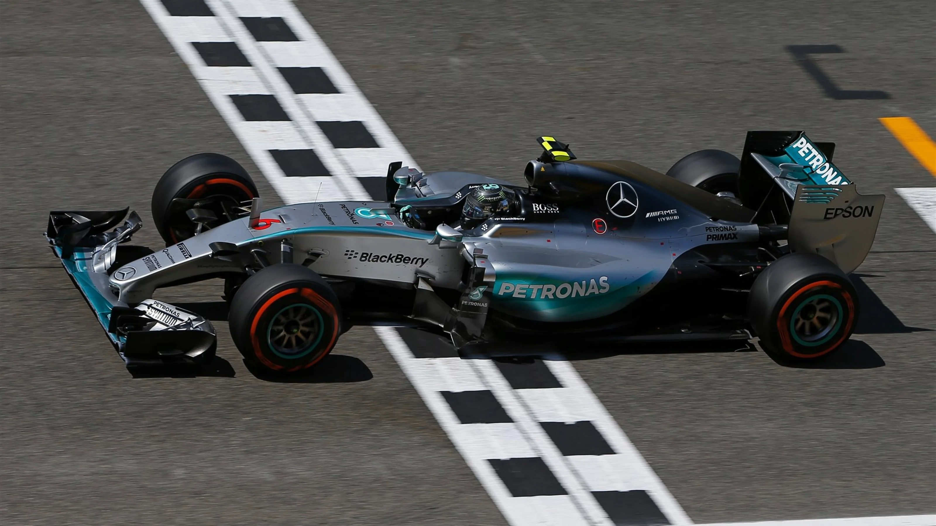 Race winner Nico Rosberg (GER) Mercedes AMG F1 W06 crosses the line at Formula One World
