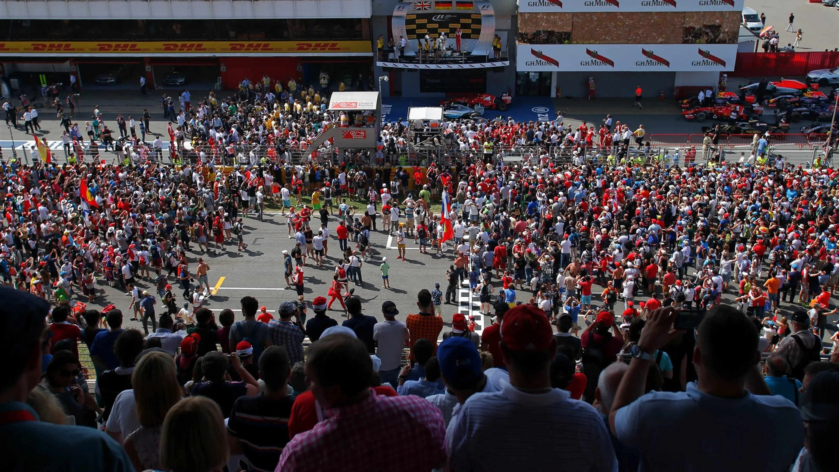 Podium ceremony viewed form the grandstand with fans on track at Formula One World Championship,