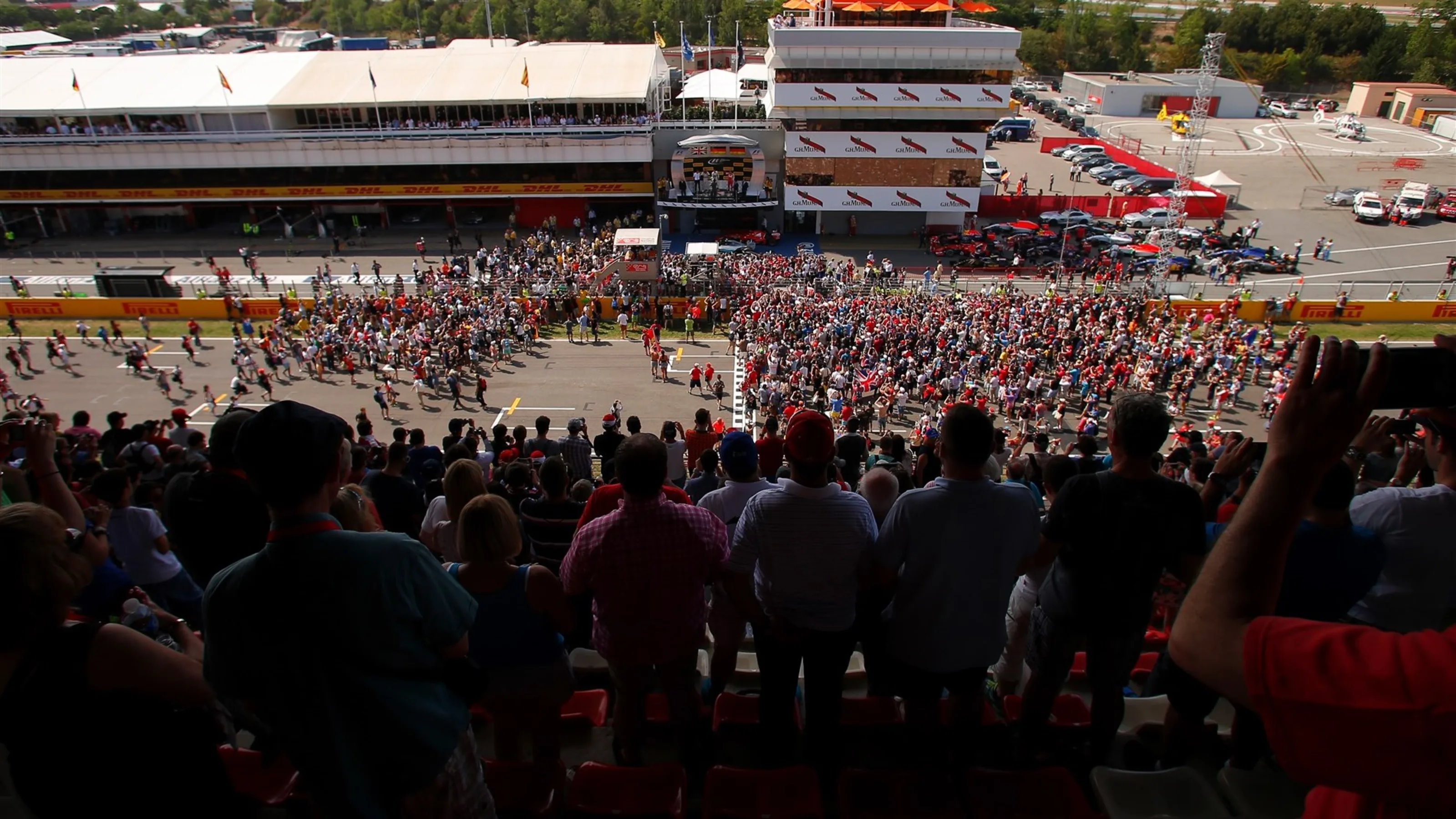 Podium ceremony viewed form the grandstand with fans on track at Formula One World Championship,