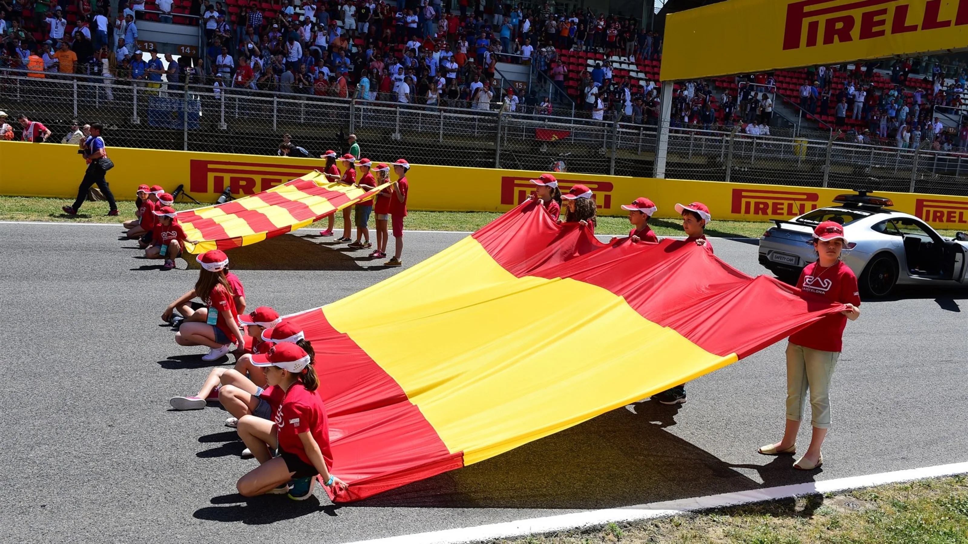 Giant flag on the grid at Formula One World Championship, Rd5, Spanish Grand Prix Qualifying,