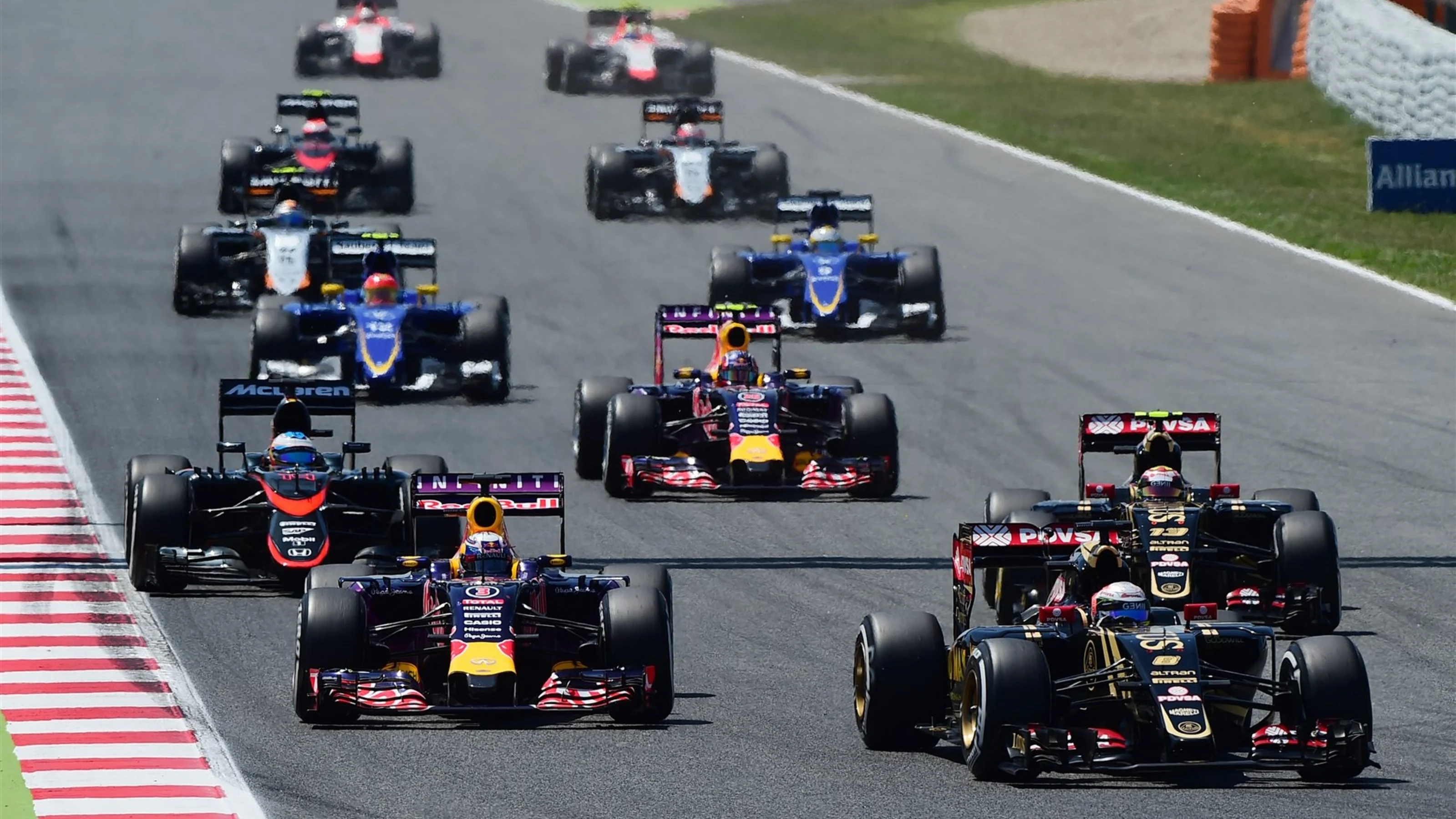 Romain Grosjean (FRA) Lotus E23 Hybrid and Daniel Ricciardo (AUS) Red Bull Racing RB11 at the start
