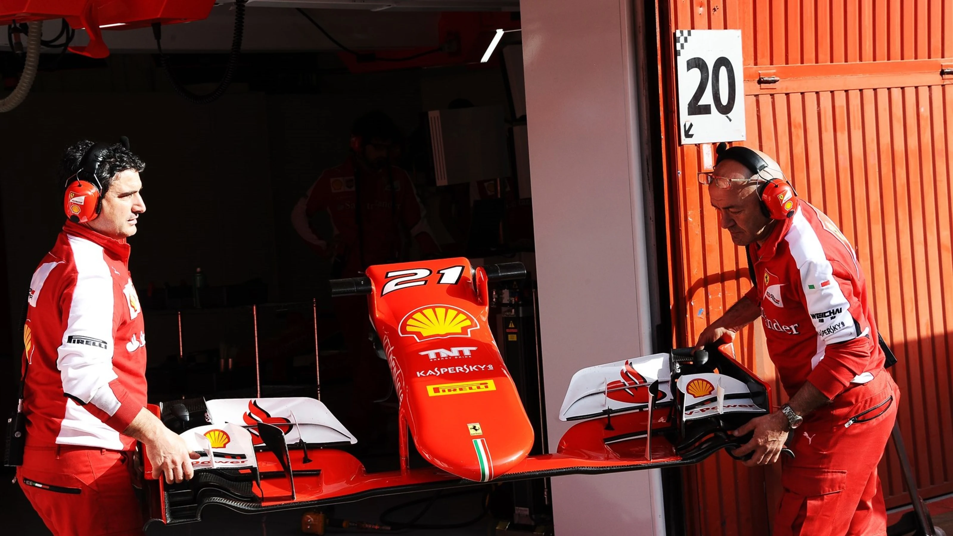 Ferrari mechanics with Ferrari SF15-T front wing at Formula One Testing, Day Two, Barcelona, Spain,
