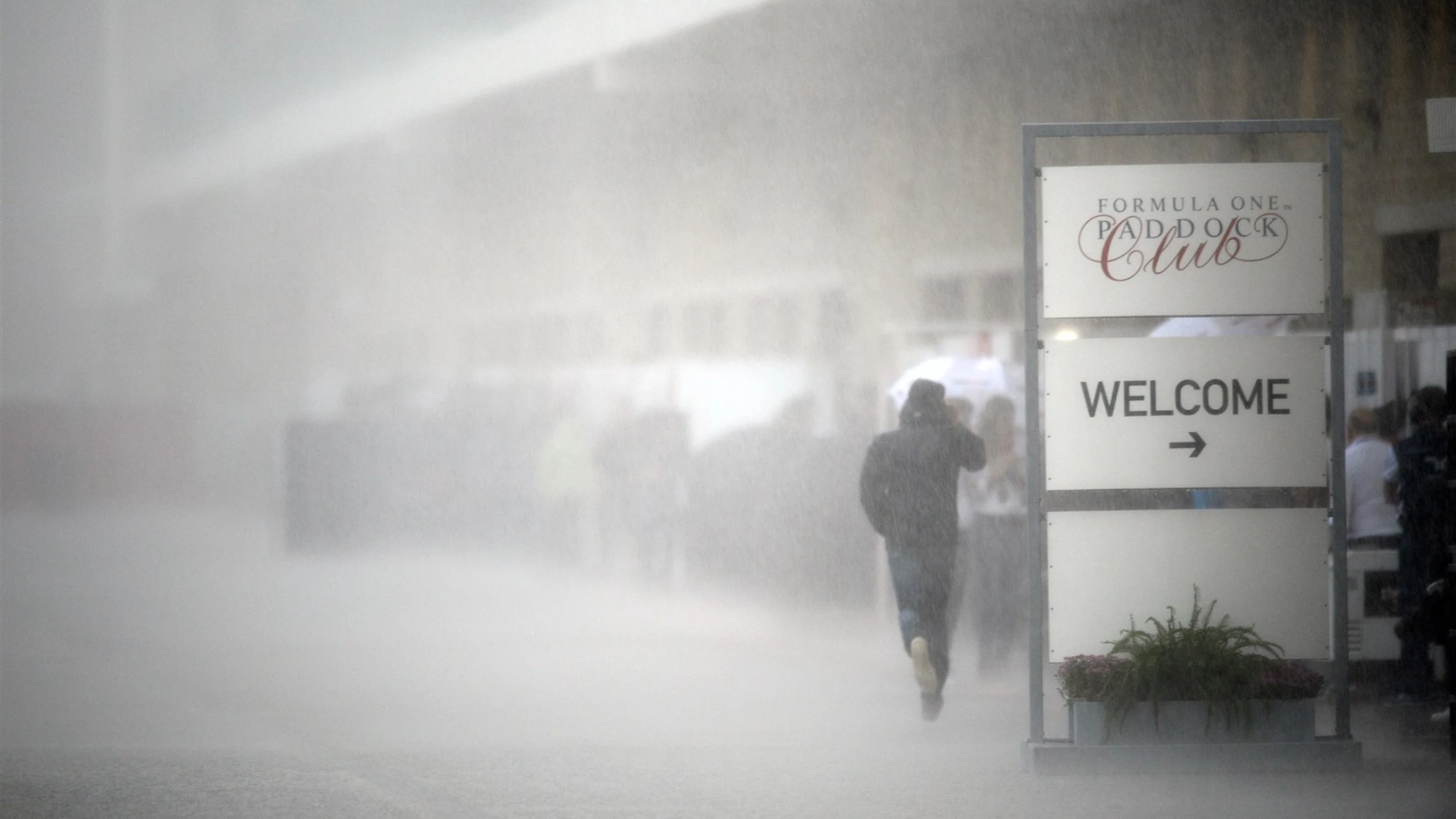 Rain in the paddock at Formula One World Championship, Rd16, United States Grand Prix, Practice,