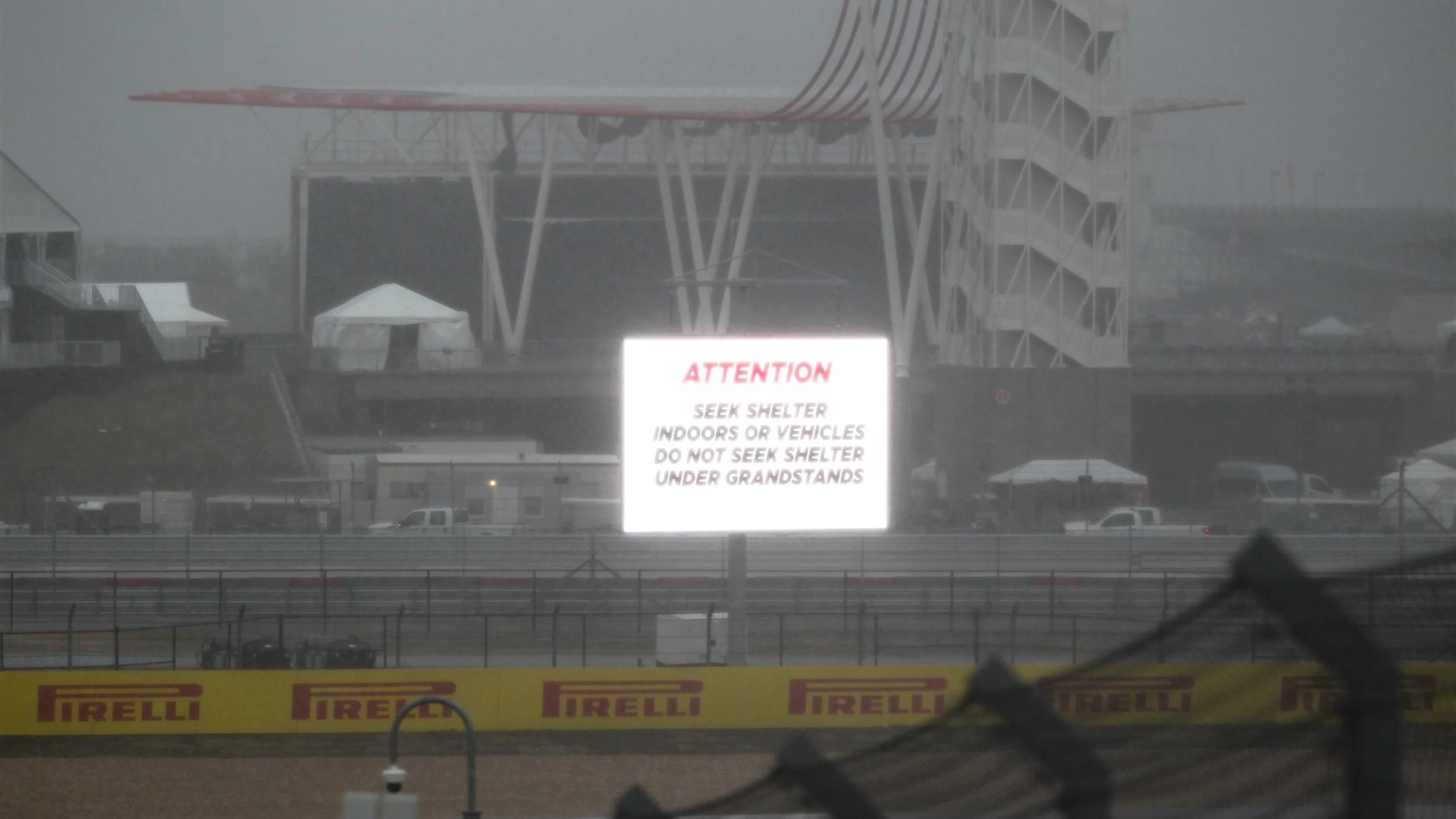 Attention signage at Formula One World Championship, Rd16, United States Grand Prix, Practice,