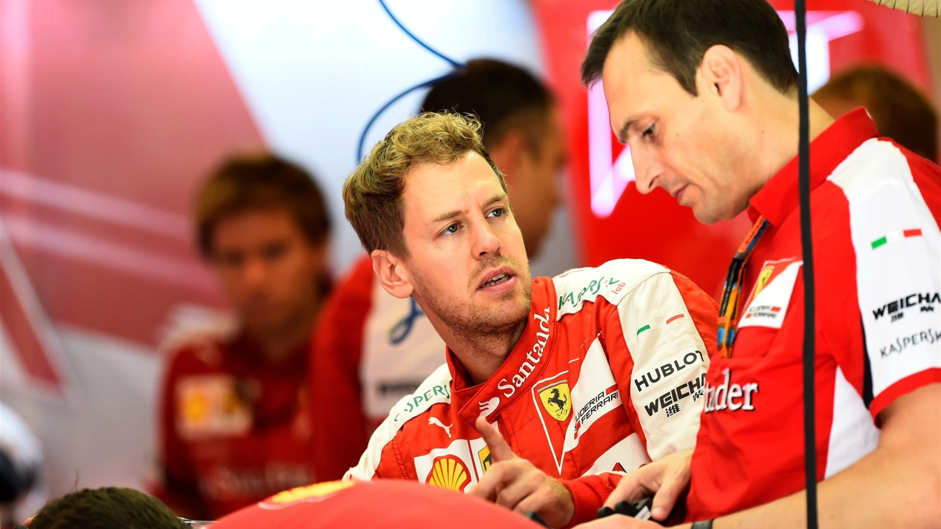 Sebastian Vettel (GER) Ferrari and Riccardo Adami (ITA) Ferrari Race Engineer at Formula One World