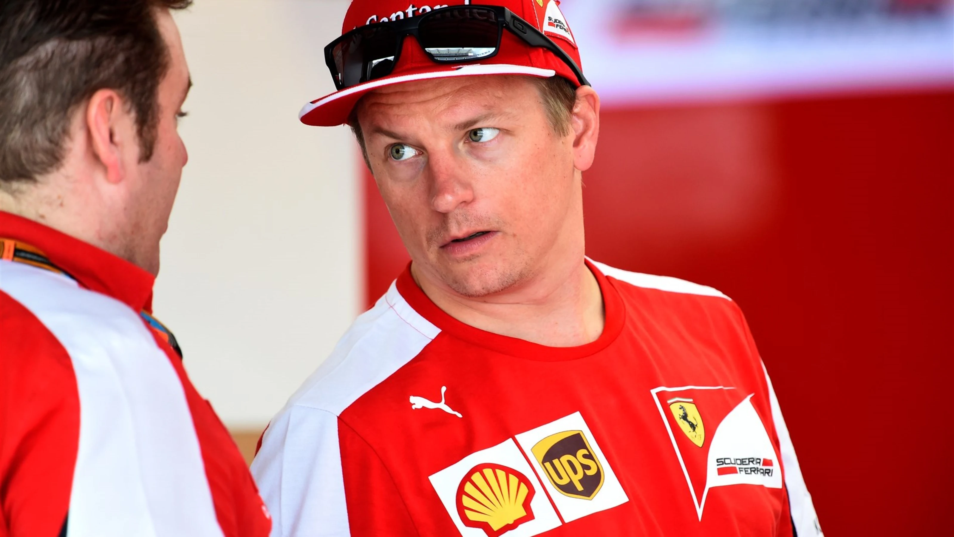 Kimi Raikkonen (FIN) Ferrari and Race Engineer Dave Greenwwod (GBR) at Formula One World