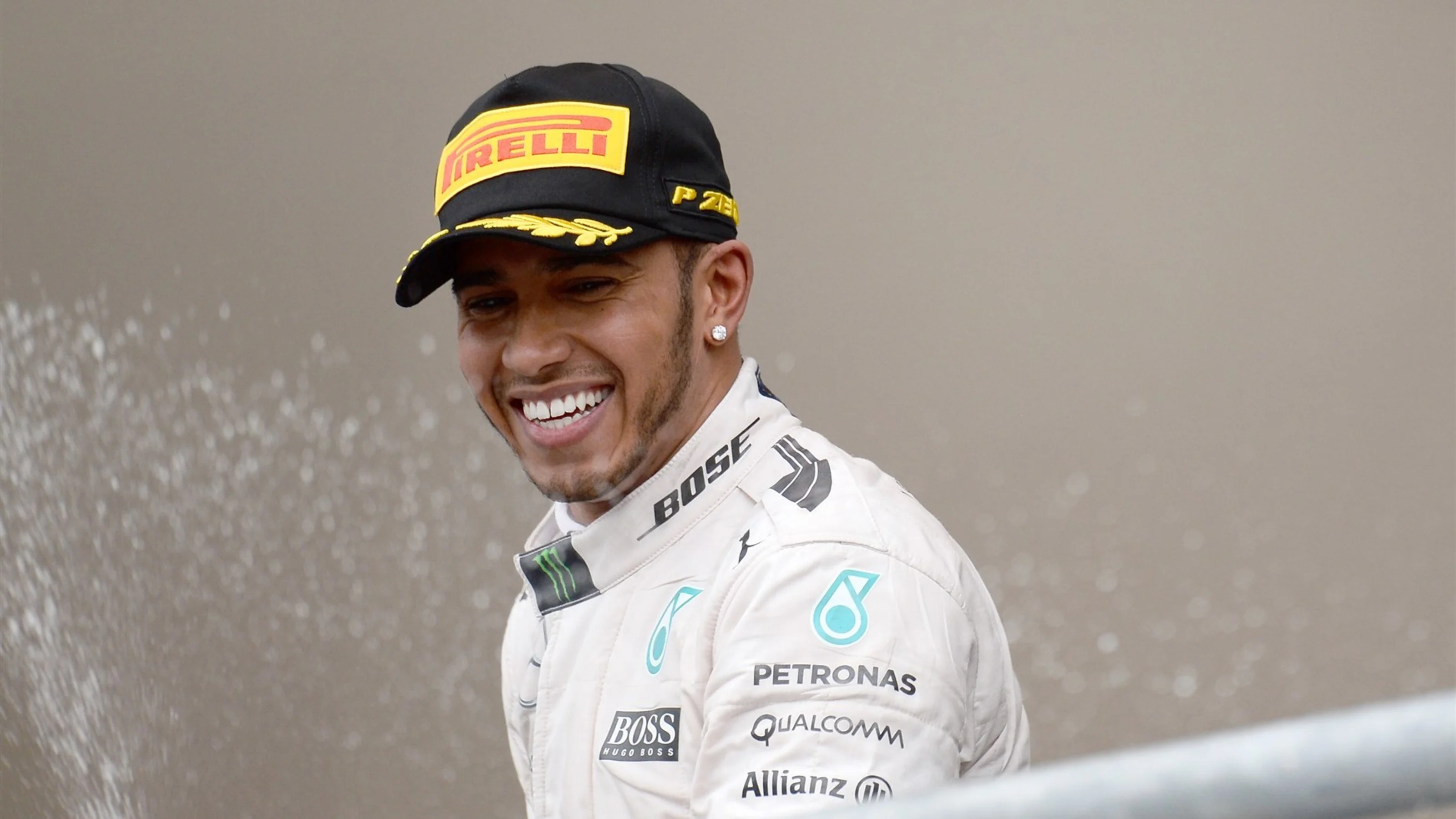 Race winner and new World Champion Lewis Hamilton (GBR) Mercedes AMG F1 celebrates on the podium