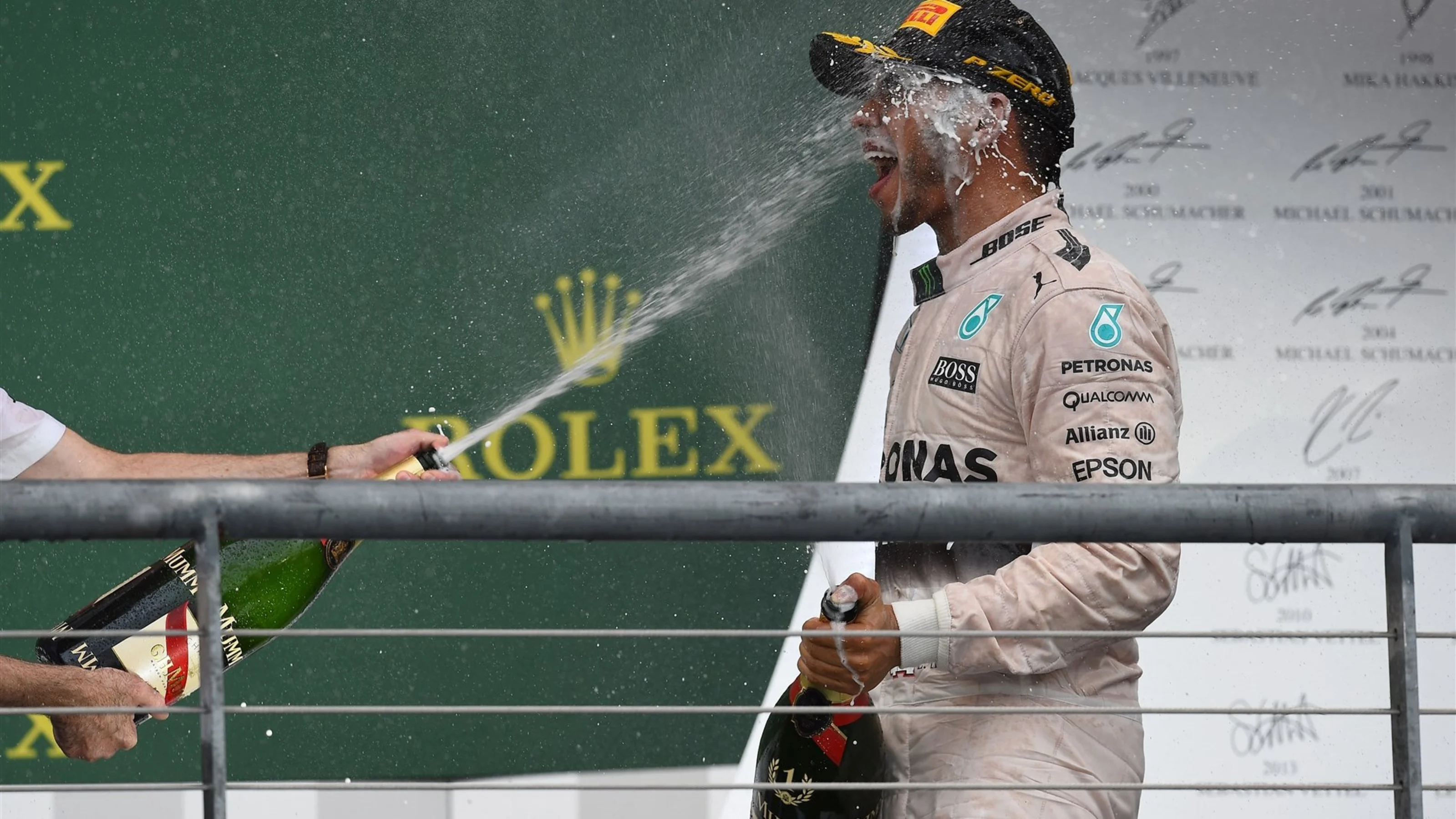 Race winner and new World Champion Lewis Hamilton (GBR) Mercedes AMG F1 celebrates on the podium