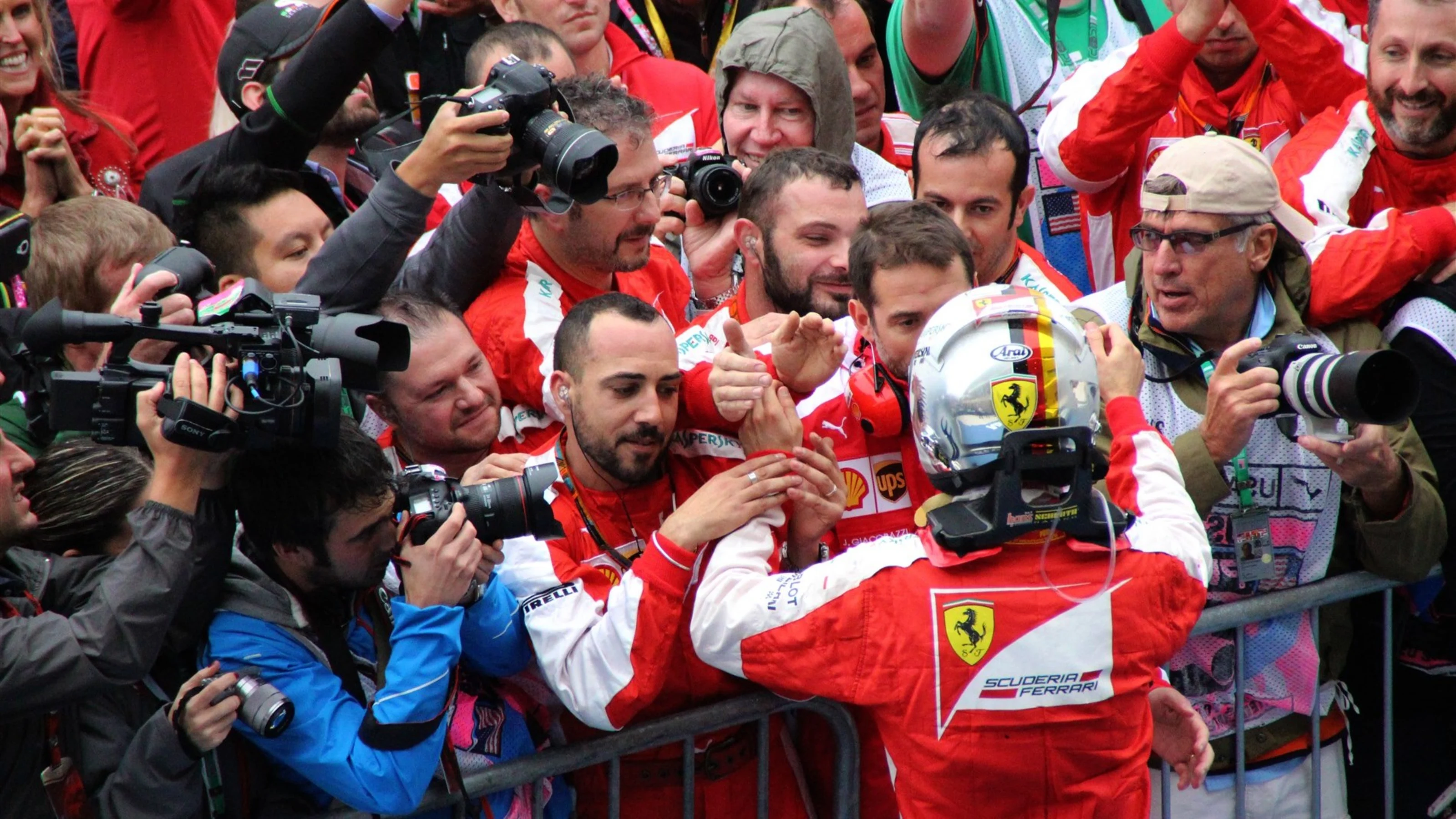 Sebastian Vettel (GER) Ferrari celebrates in parc ferme at Formula One World Championship, Rd16,