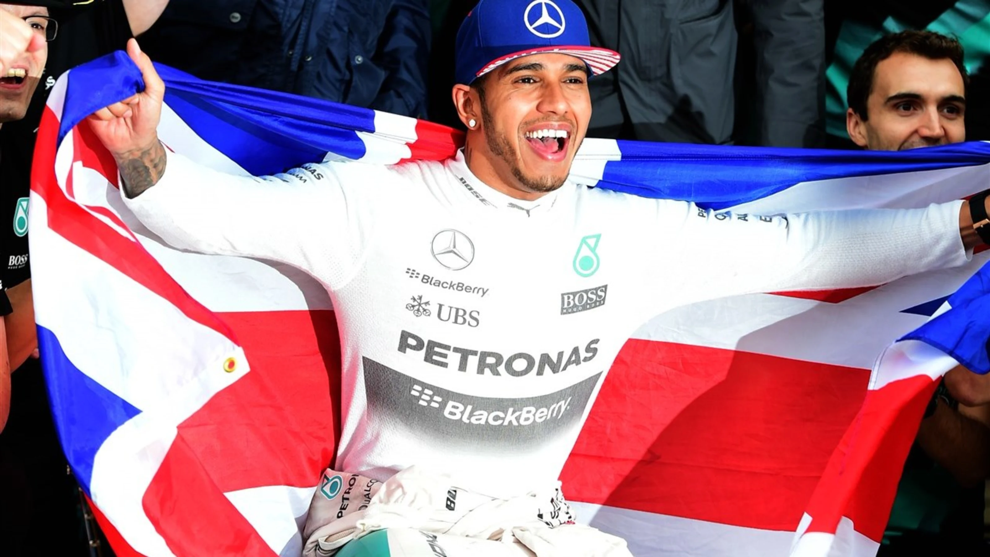 Race winner and new World Champion Lewis Hamilton (GBR) Mercedes AMG F1 celebrates with the team at
