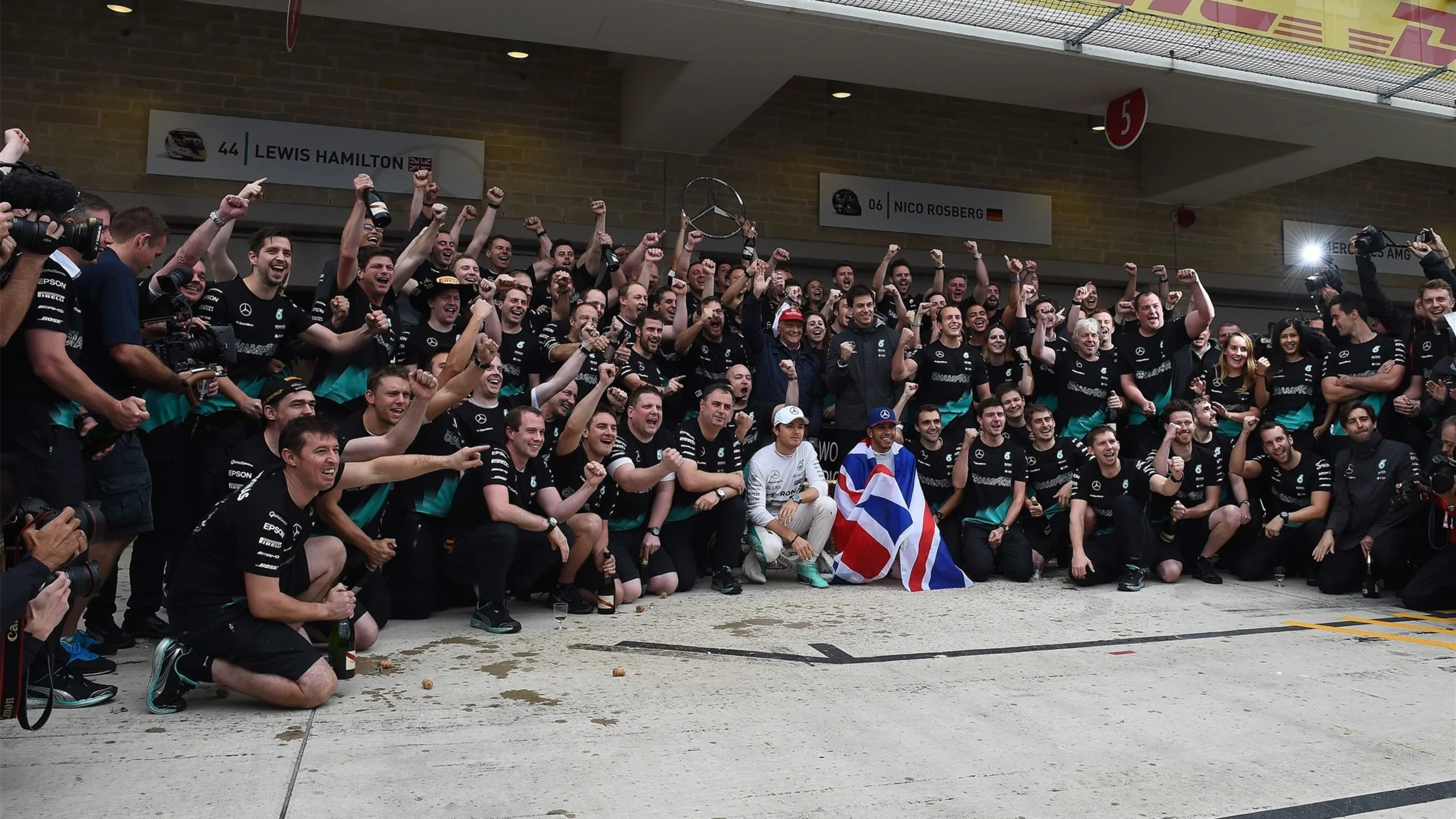 Race winner and New World Champion Lewis Hamilton (GBR) Mercedes AMG F1 celebrates with Nico