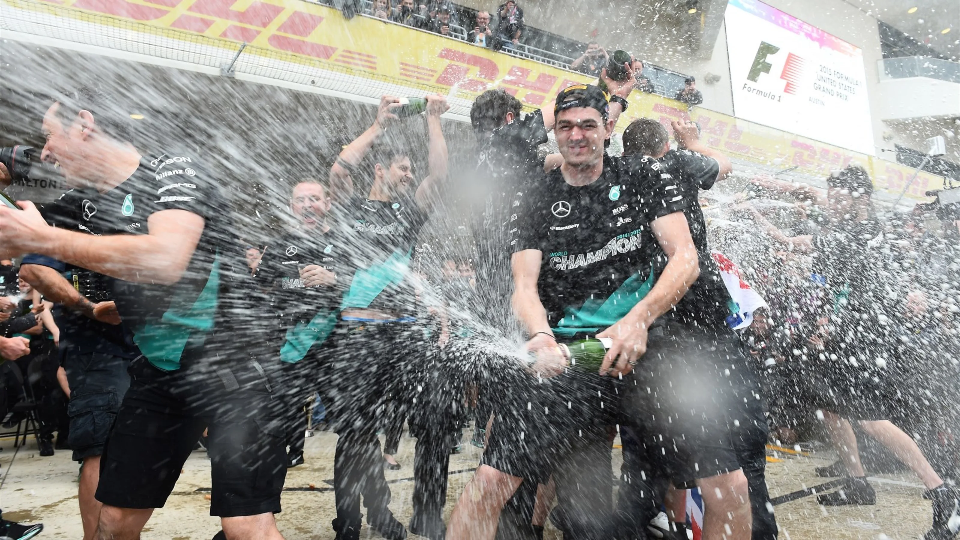 Mercedes AMG F1 celebrates with the champagne at Formula One World Championship, Rd16, United
