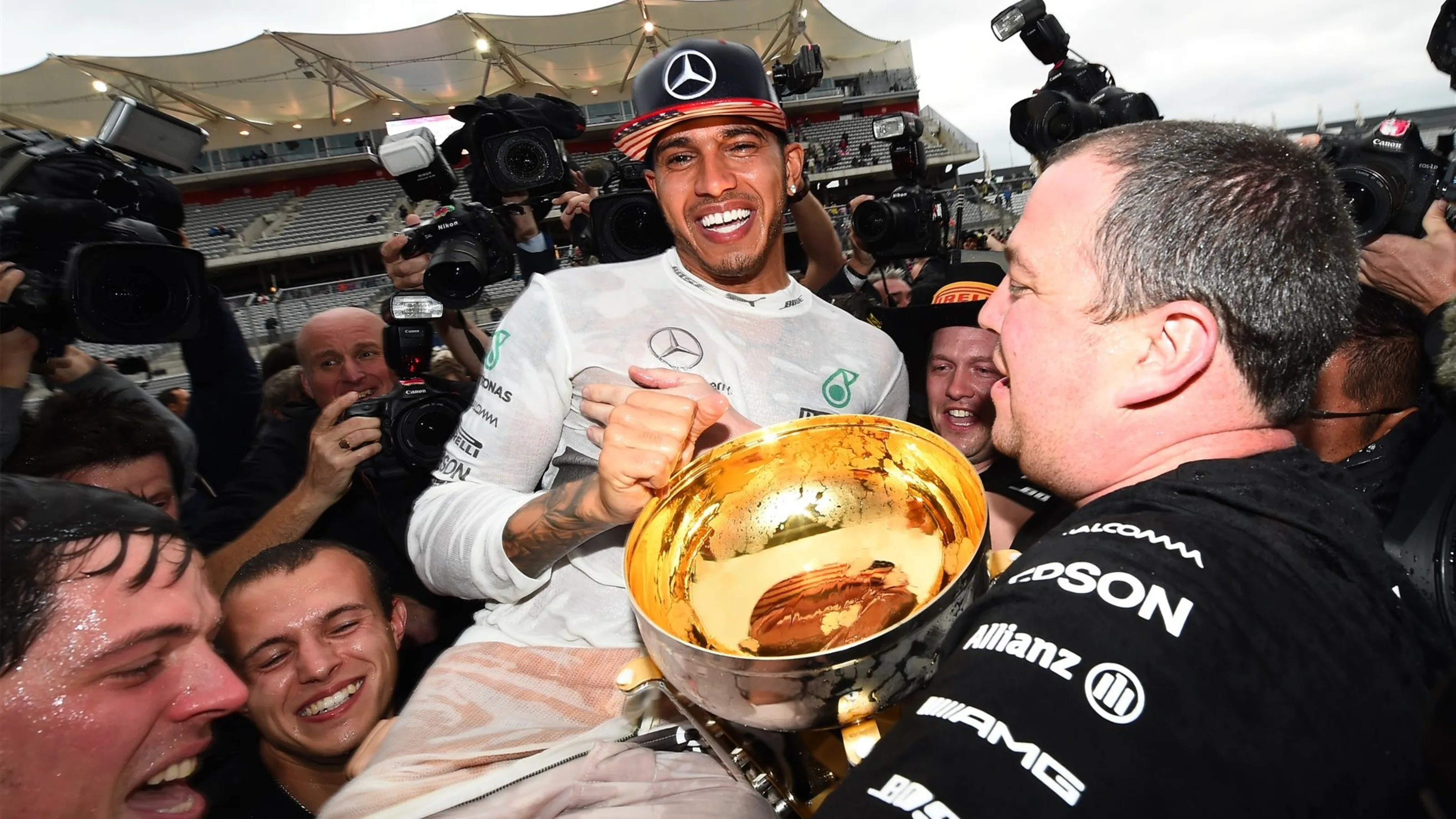 Race winner and new World Champion Lewis Hamilton (GBR) Mercedes AMG F1 celebrates with the team at