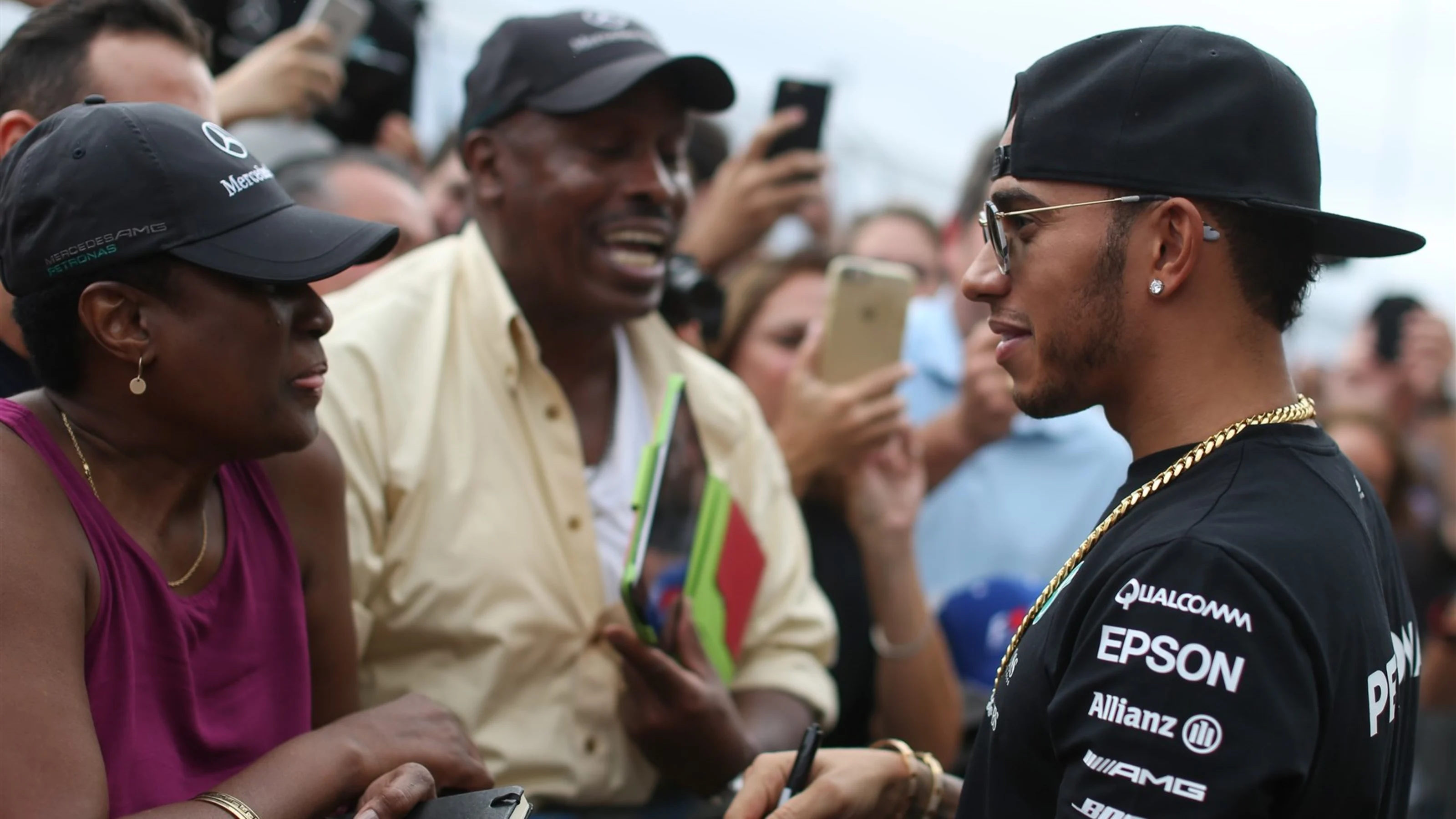 Lewis Hamilton (GBR) Mercedes AMG F1 signs autographs for the fans at Formula One World