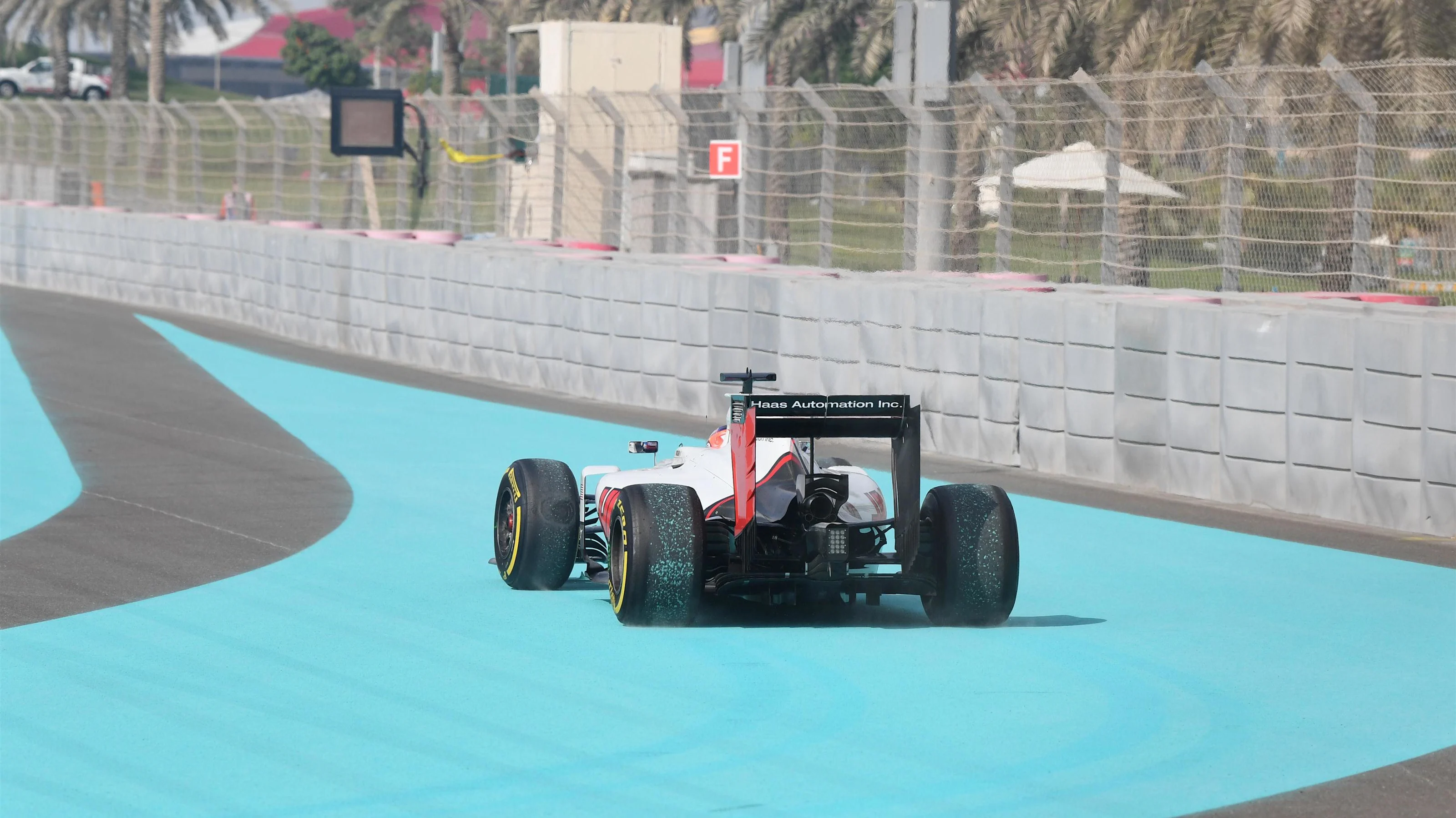 Romain Grosjean (FRA) Haas VF-16 runs wide in FP1 at Formula One World Championship, Rd21, Abu
