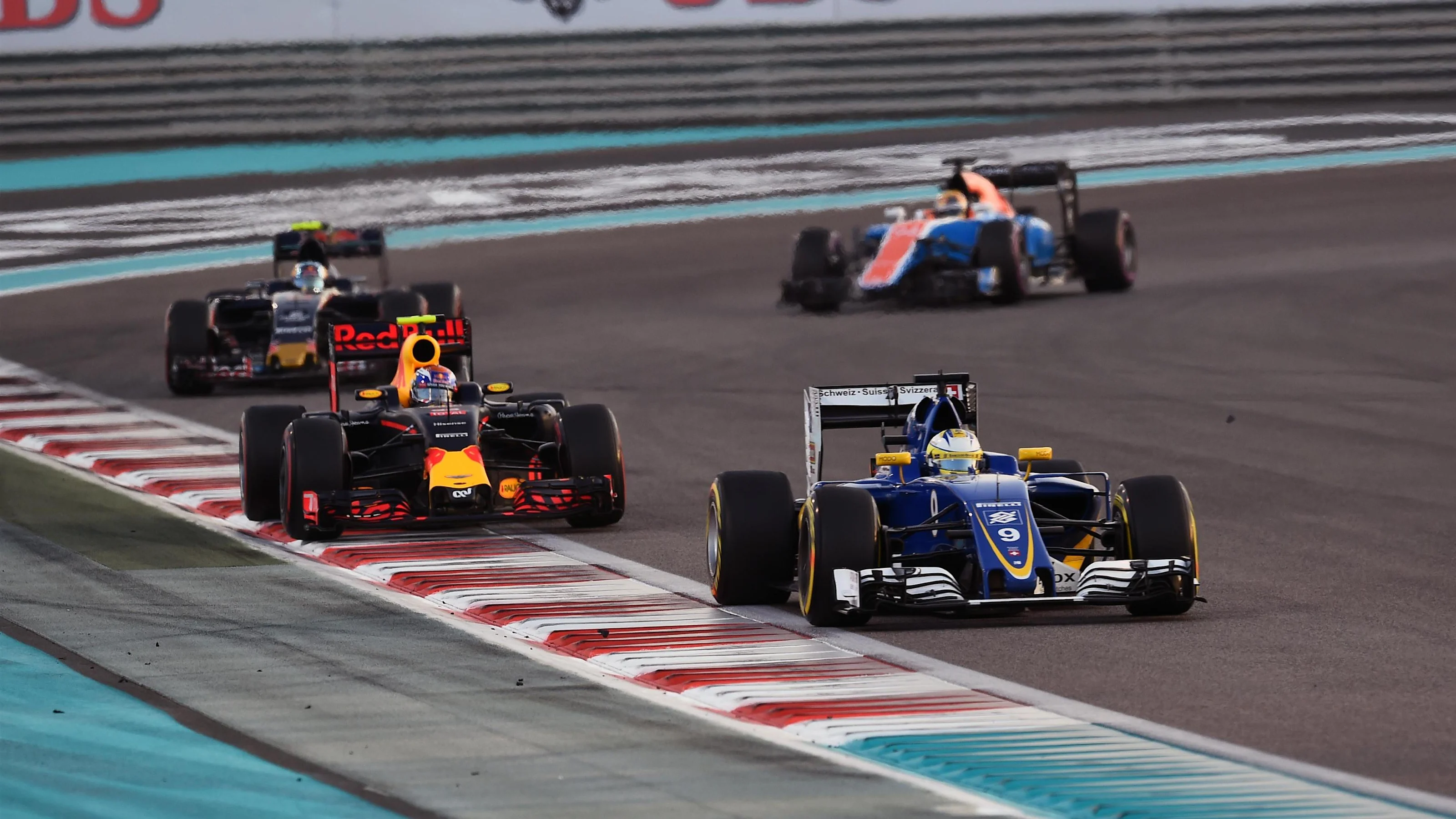 Max Verstappen (NED) Red Bull Racing RB12 and Marcus Ericsson (SWE) Sauber C35 at Formula One World