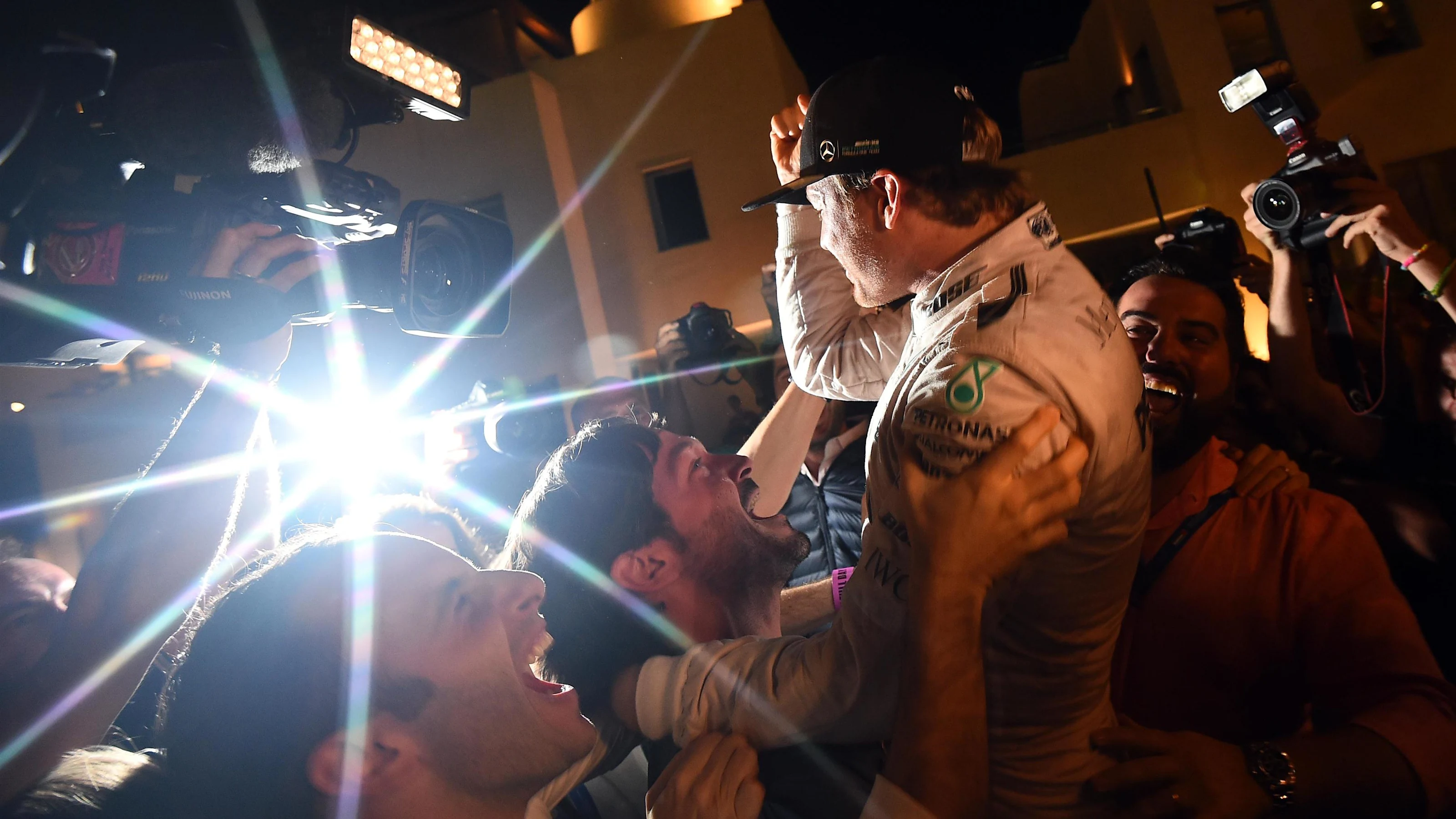 World Champion Nico Rosberg (GER) Mercedes AMG F1 celebrates with friends and the team at Formula