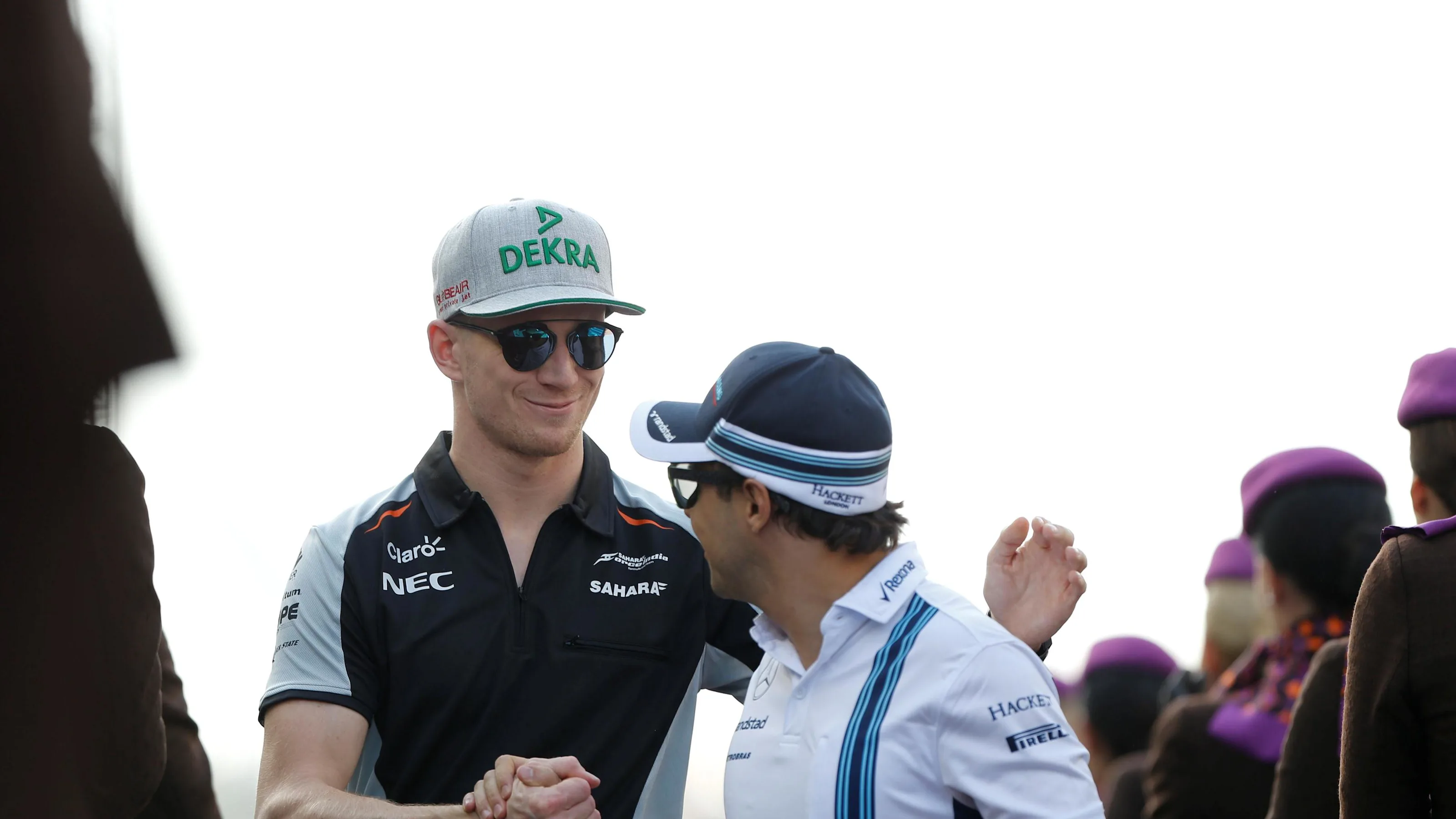 Nico Hulkenberg (GER) Force India F1 and Felipe Massa (BRA) Williams on the drivers parade at