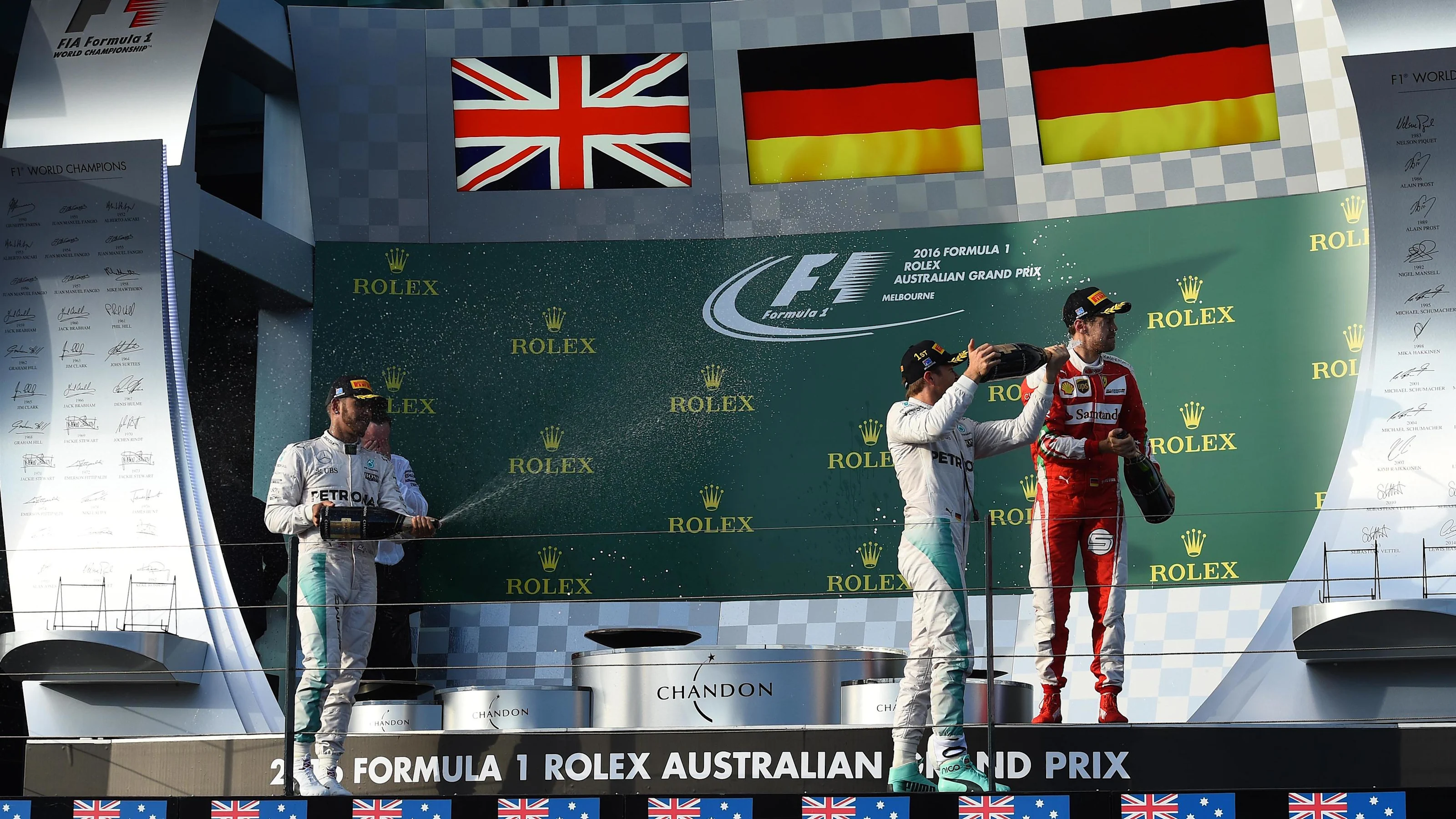 (L to R): Lewis Hamilton (GBR) Mercedes AMG F1, Race winner Nico Rosberg (GER) Mercedes AMG F1 and