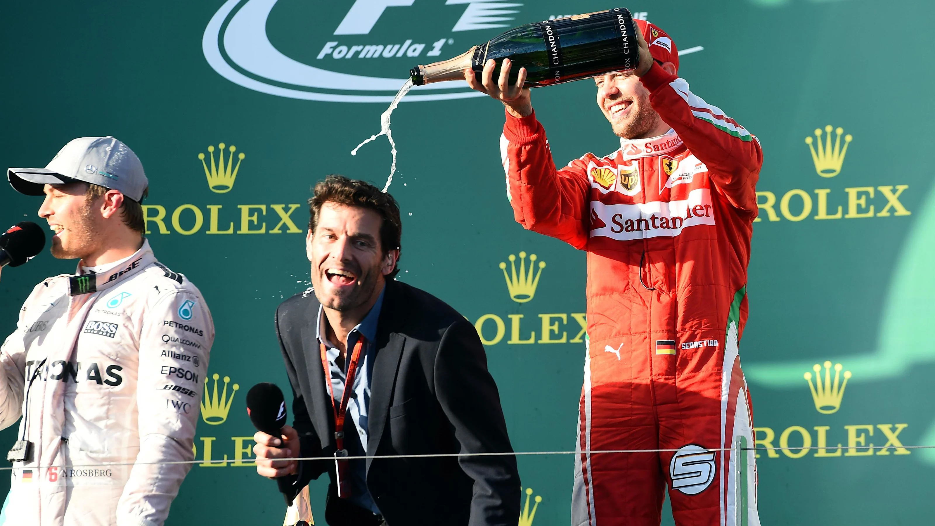 (L to R): Race winner Nico Rosberg (GER) Mercedes AMG F1, Mark Webber (AUS) and Sebastian Vettel