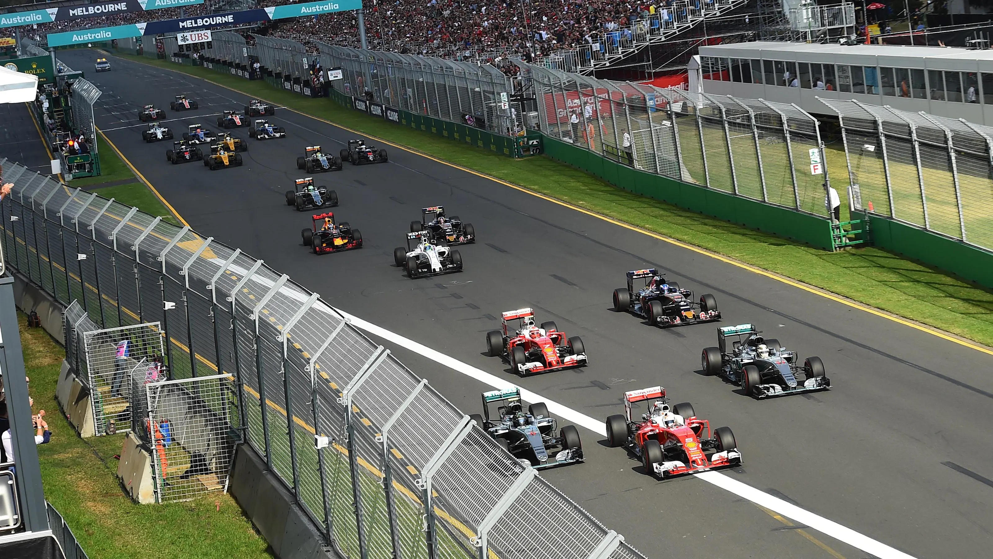 Sebastian Vettel (GER) Ferrari SF16-H leads Nico Rosberg (GER) Mercedes-Benz F1 W07 Hybrid and