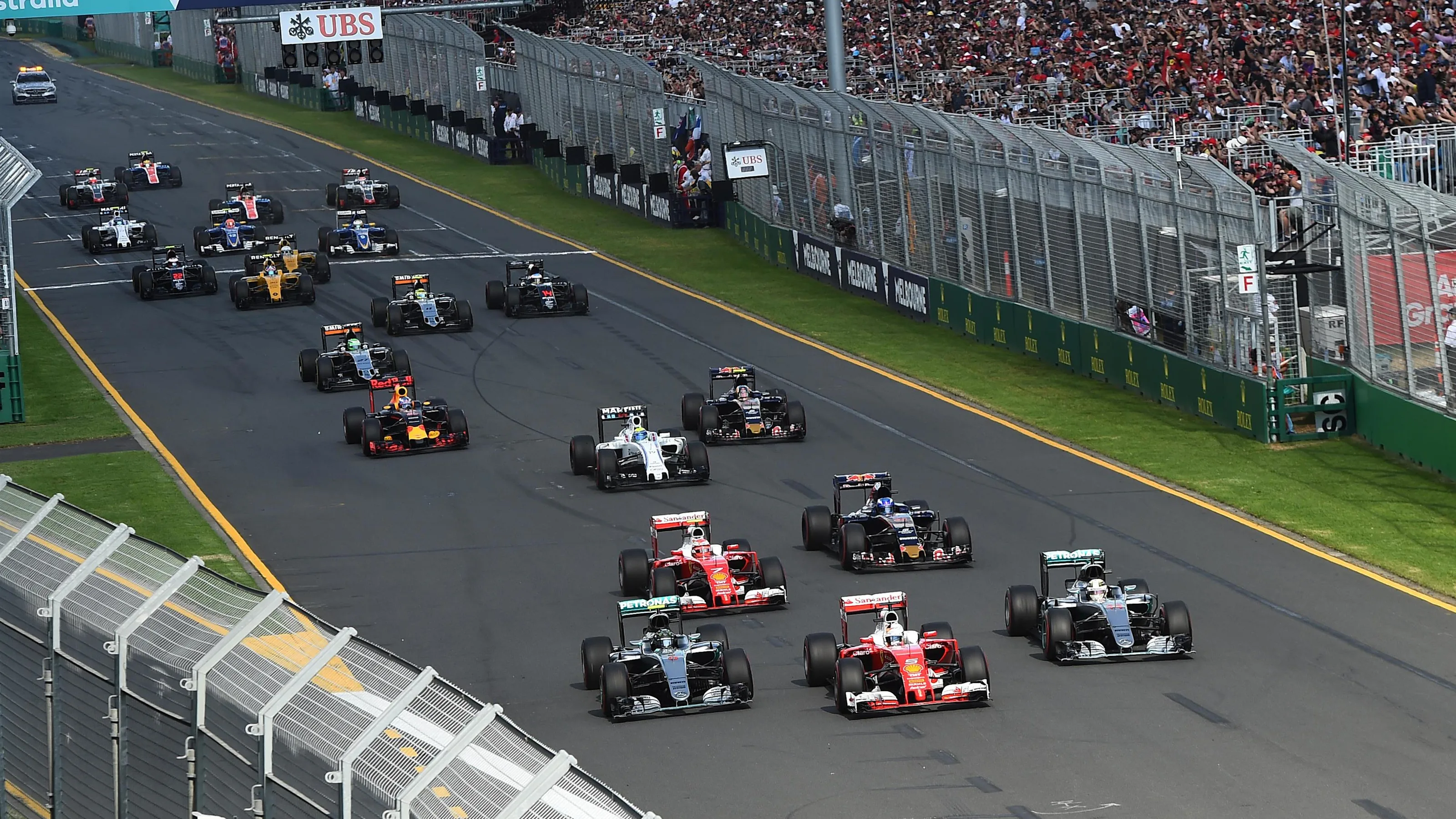 Sebastian Vettel (GER) Ferrari SF16-H leads Nico Rosberg (GER) Mercedes-Benz F1 W07 Hybrid and