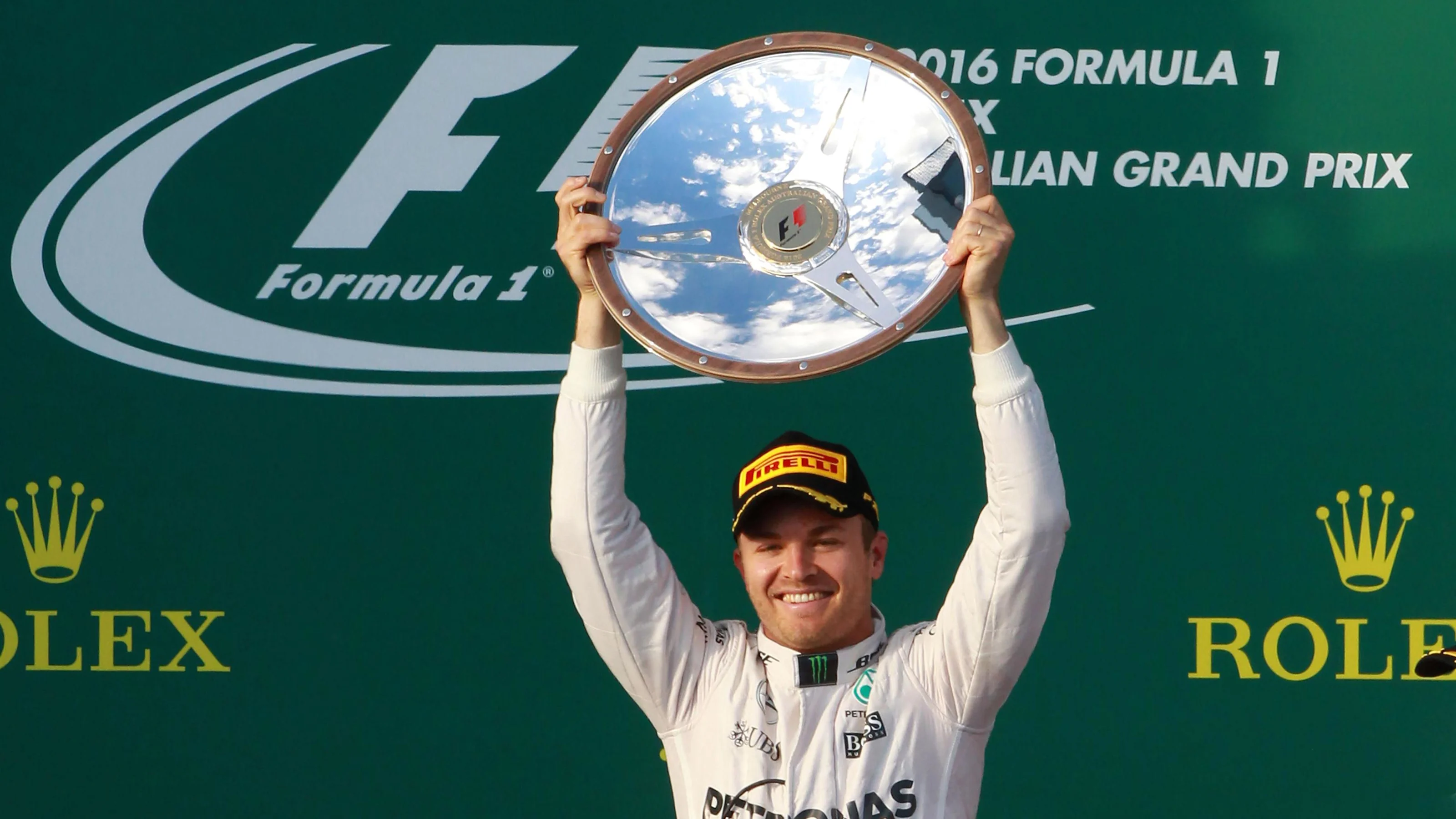 Race winner Nico Rosberg (GER) Mercedes AMG F1 celebrates on the podium with the trophy at Formula