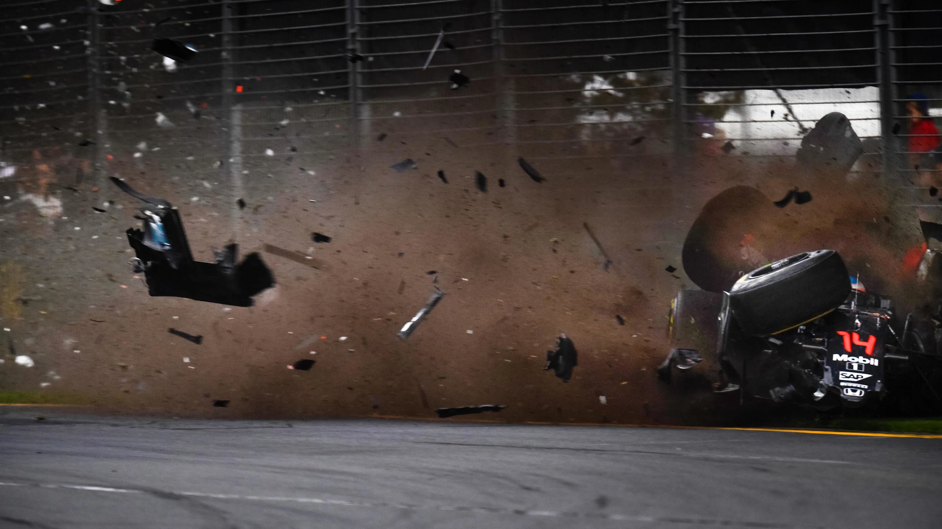 Fernando Alonso (ESP) McLaren MP4-31 crashes at Formula One World Championship, Rd1, Australian