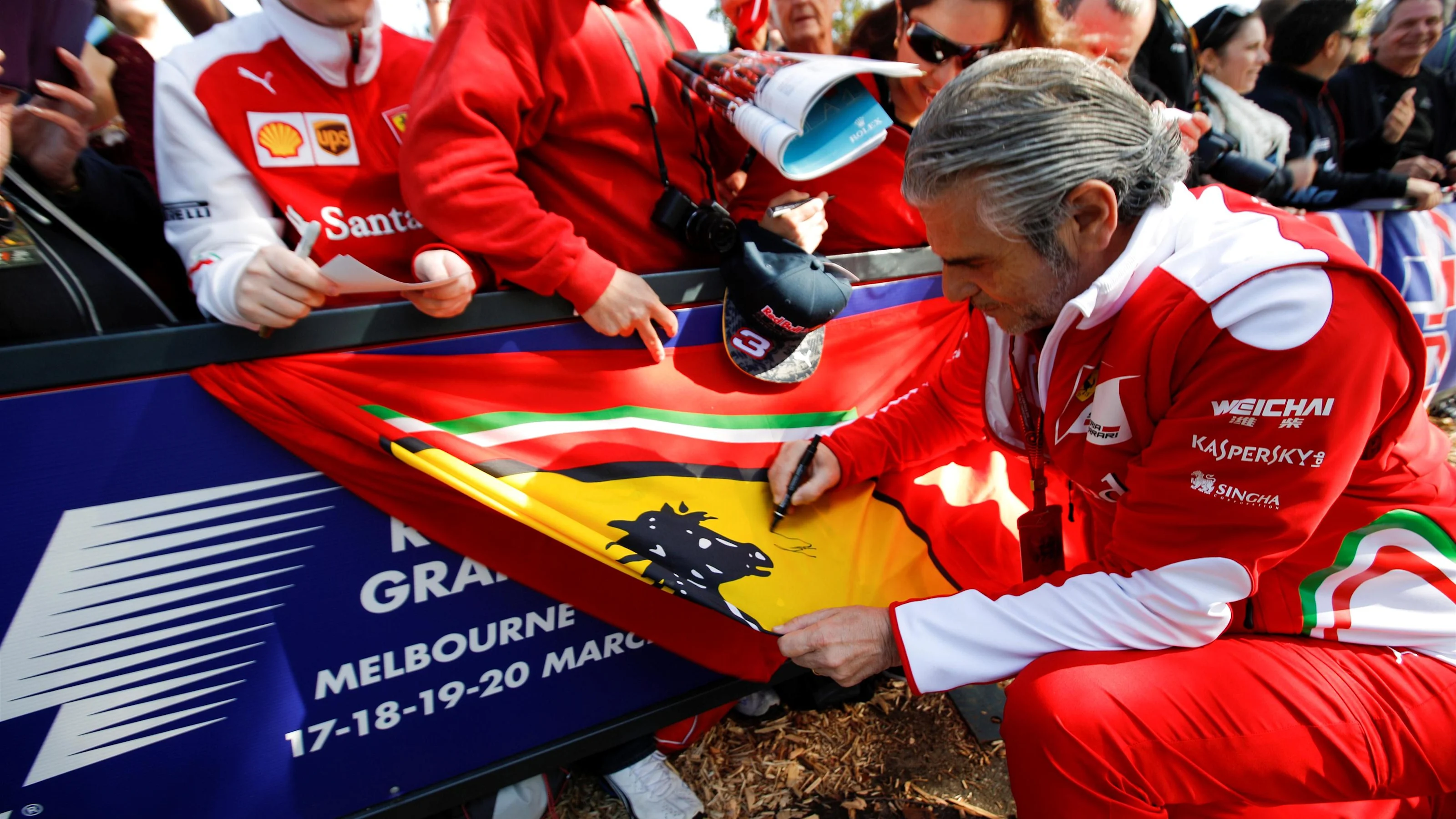 Maurizio Arrivabene (ITA) Ferrari Team Principal signs autographs for the fans at Formula One World