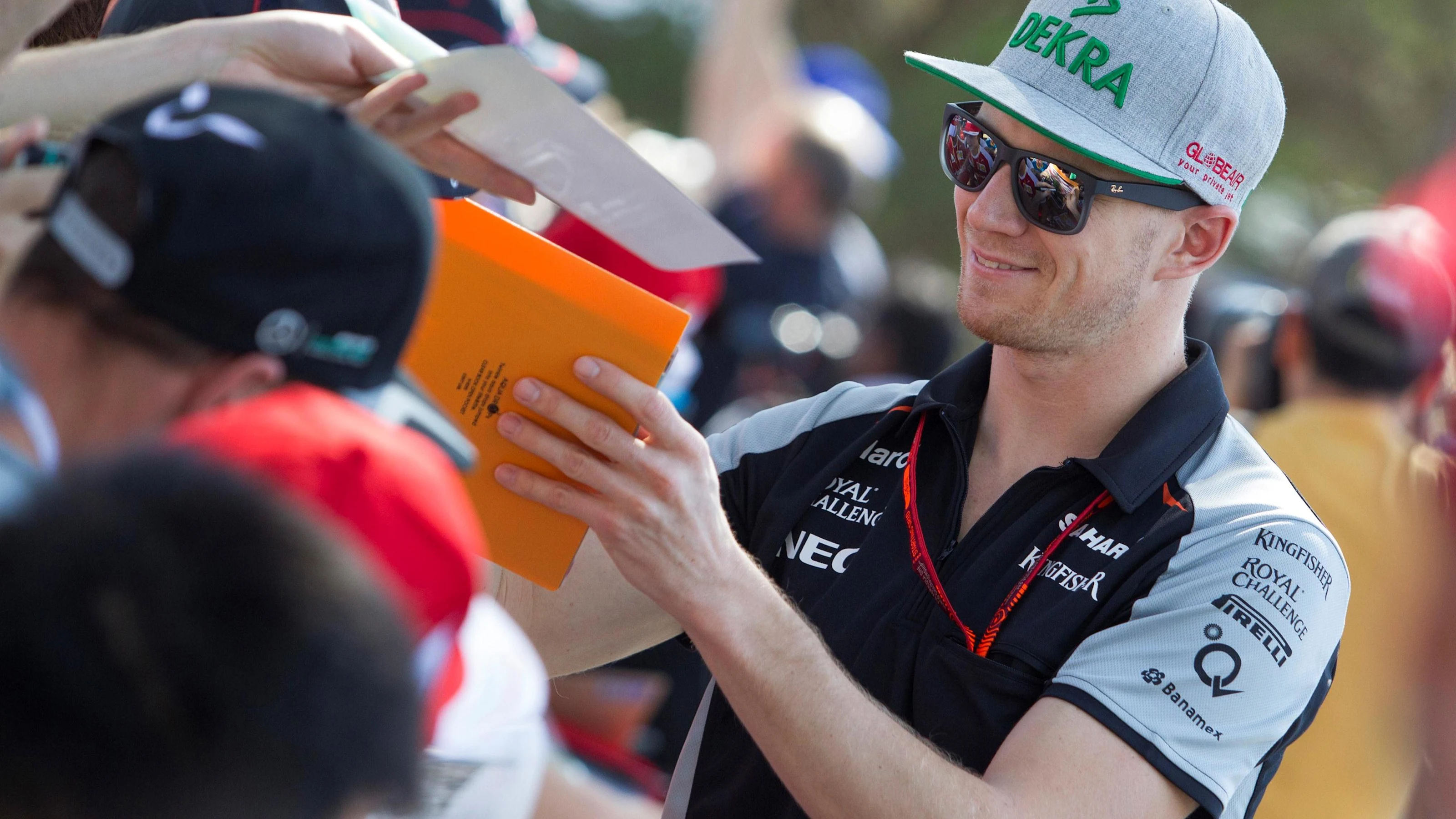 Nico Hulkenberg (GER) Force India F1 signs autographs for the fans at Formula One World