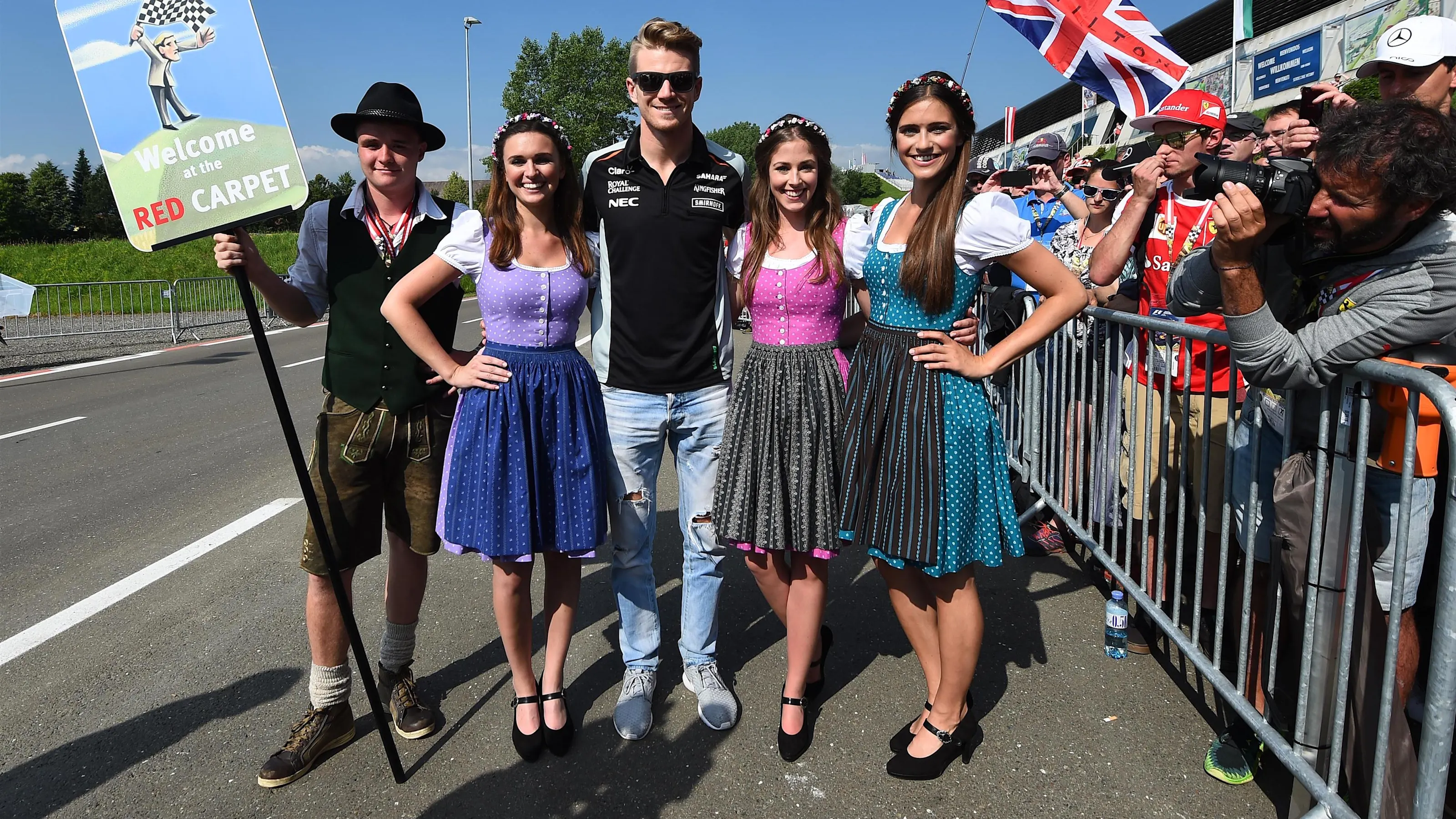Nico Hulkenberg (GER) Force India F1 with girls at Formula One World Championship, Rd9, Austrian