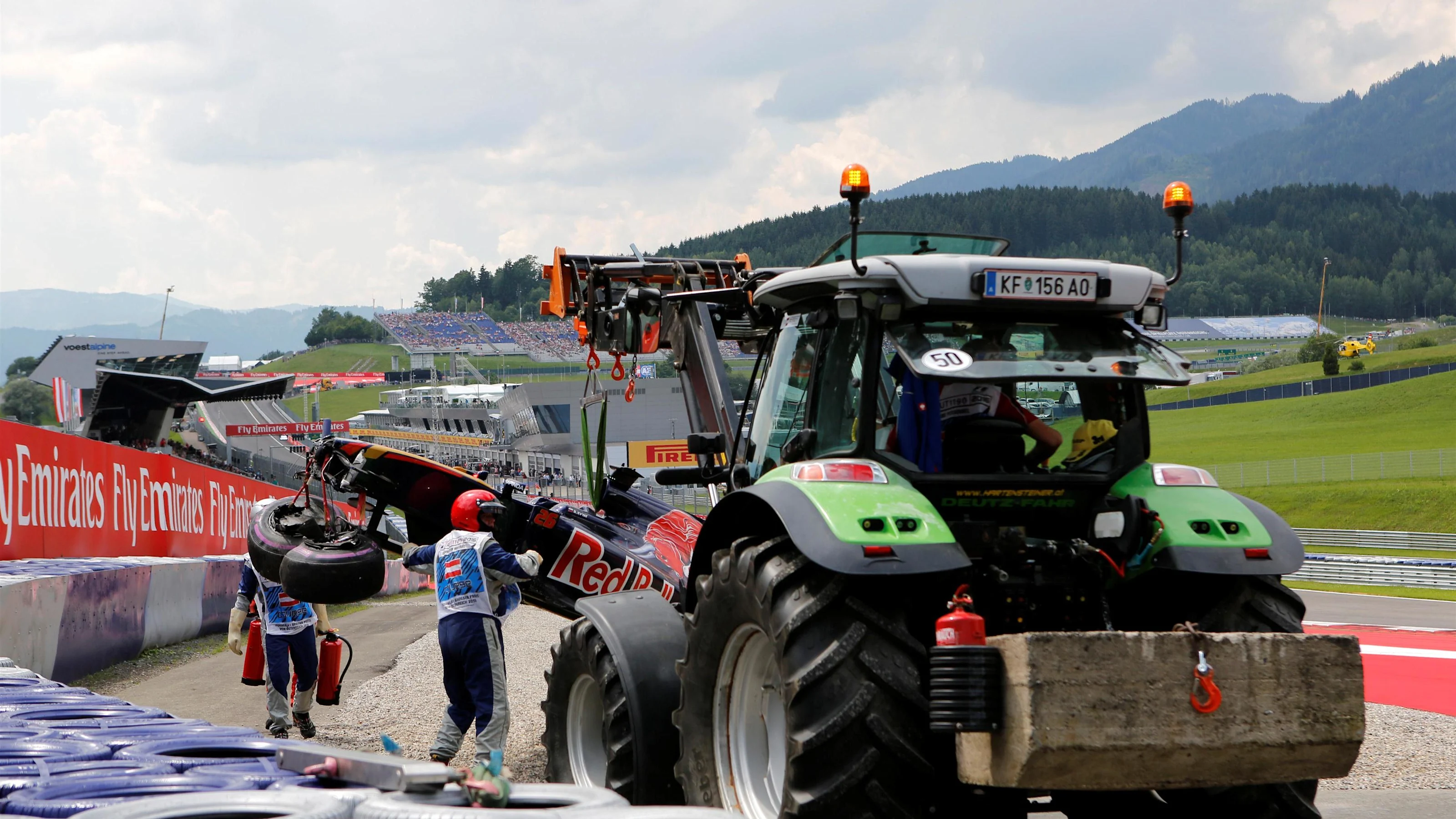 The crashed car of Daniil Kvyat (RUS) Scuderia Toro Rosso is recovered in Q1 at Formula One World