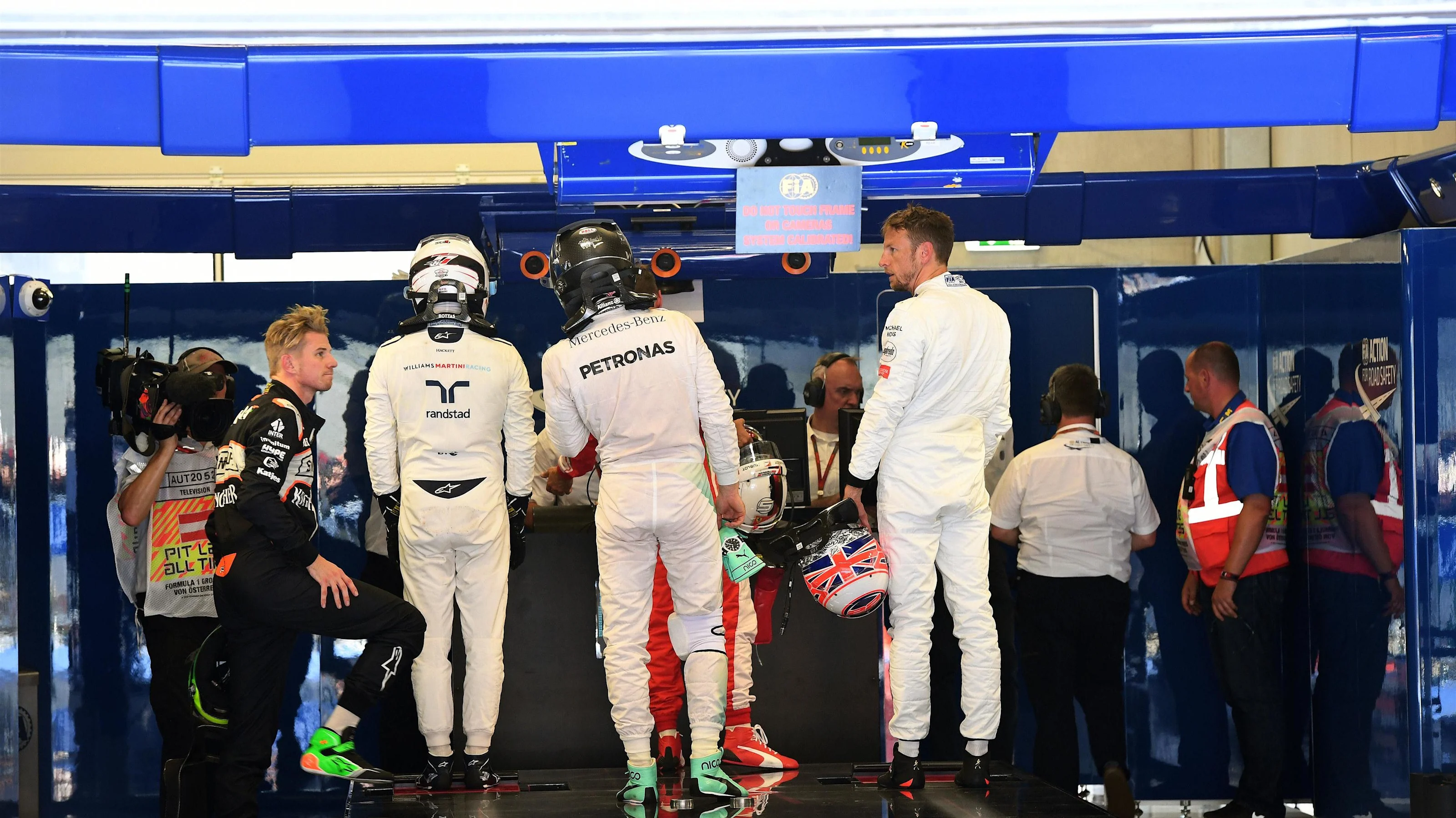 Valtteri Bottas (FIN) Williams, Nico Rosberg (GER) Mercedes AMG F1 and Jenson Button (GBR) McLaren