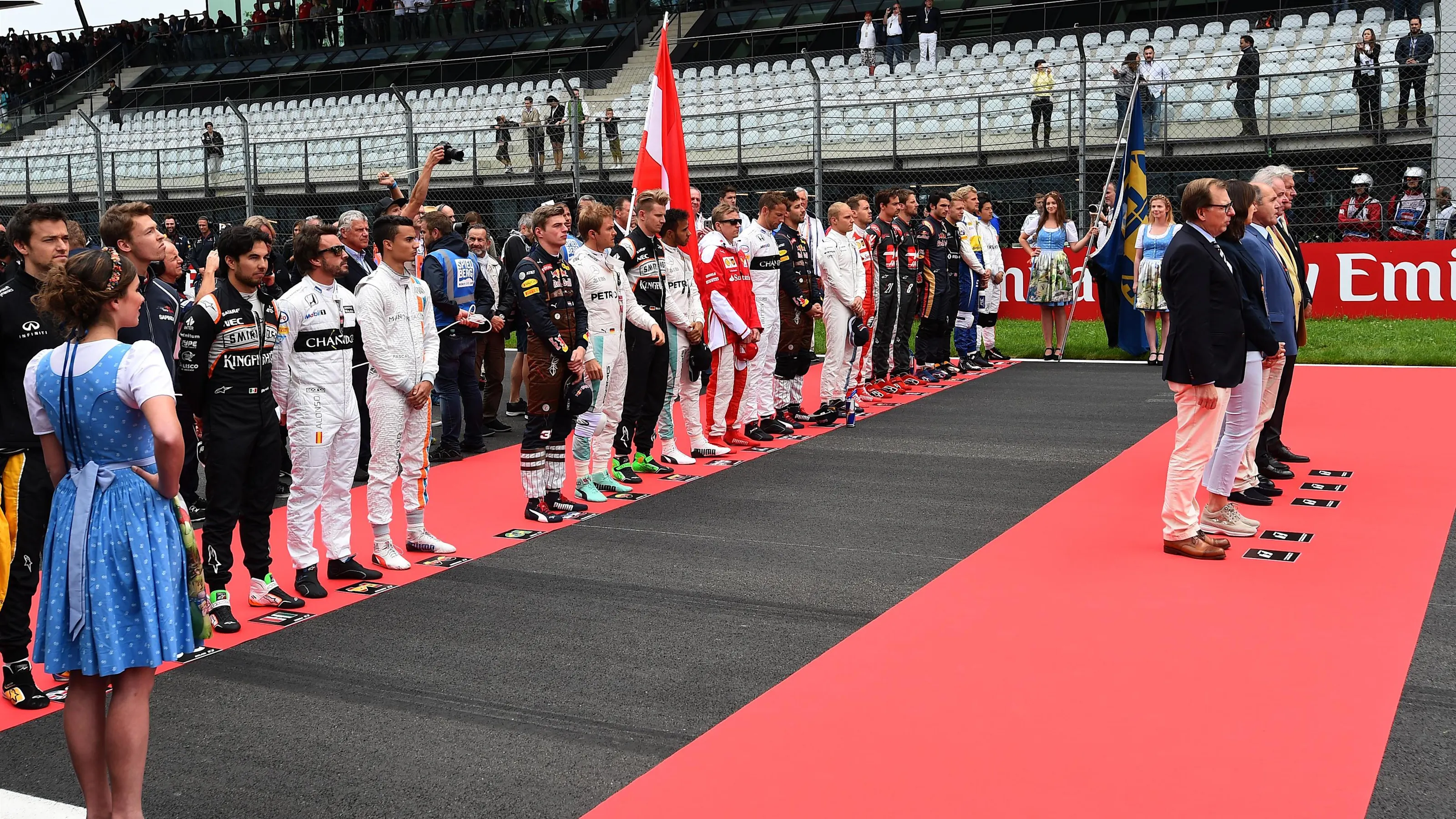 Drivers line the grid for the national Anthem at Formula One World Championship, Rd9, Austrian
