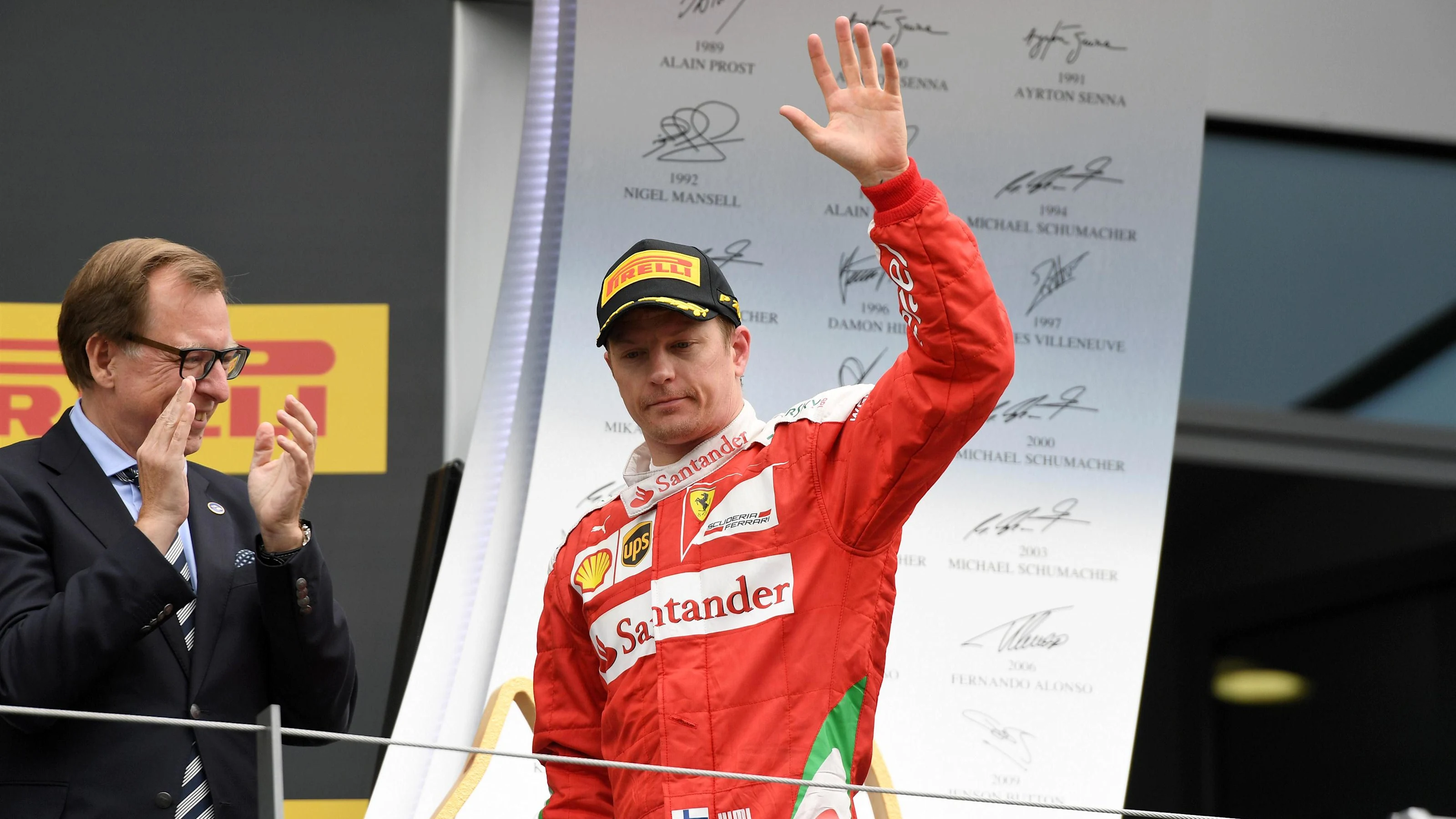 Kimi Raikkonen (FIN) Ferrari celebrates on the podium at Formula One World Championship, Rd9,