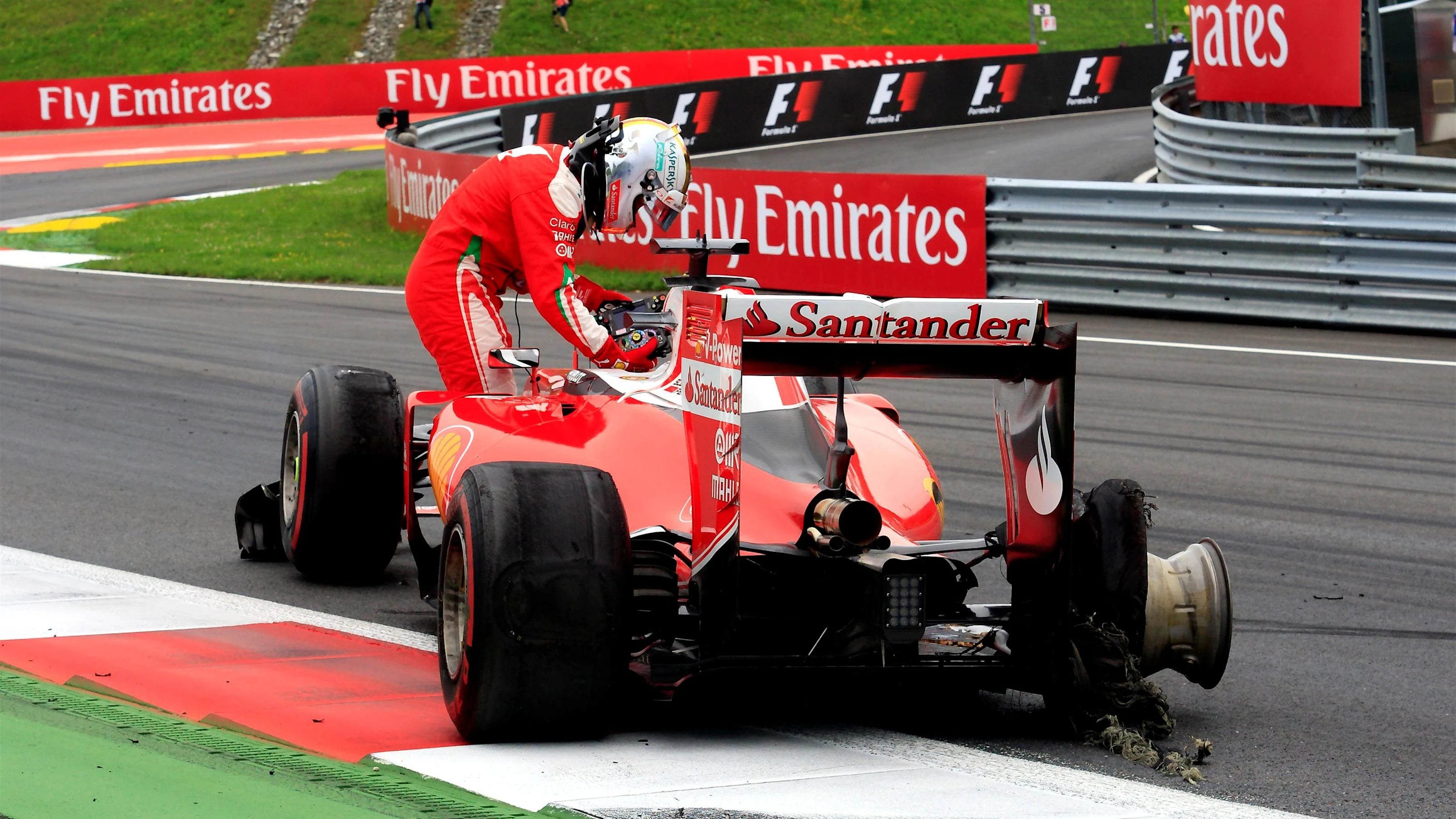 Sebastian Vettel (GER) Ferrari SF16-H retired from the race with a blown rear tyre at Formula One