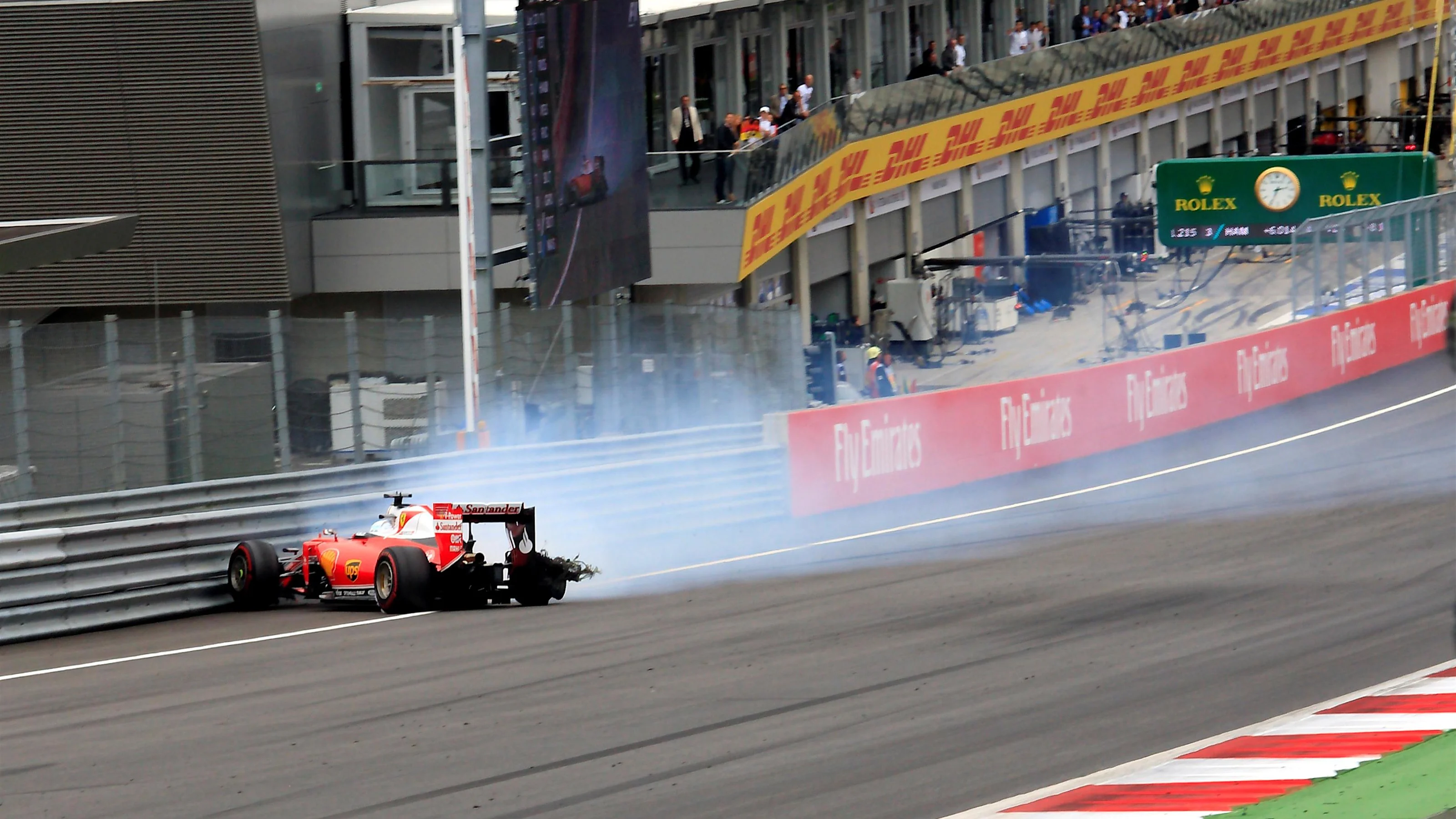 Sebastian Vettel (GER) Ferrari SF16-H crashes out of the race with a blown rear tyre at Formula One