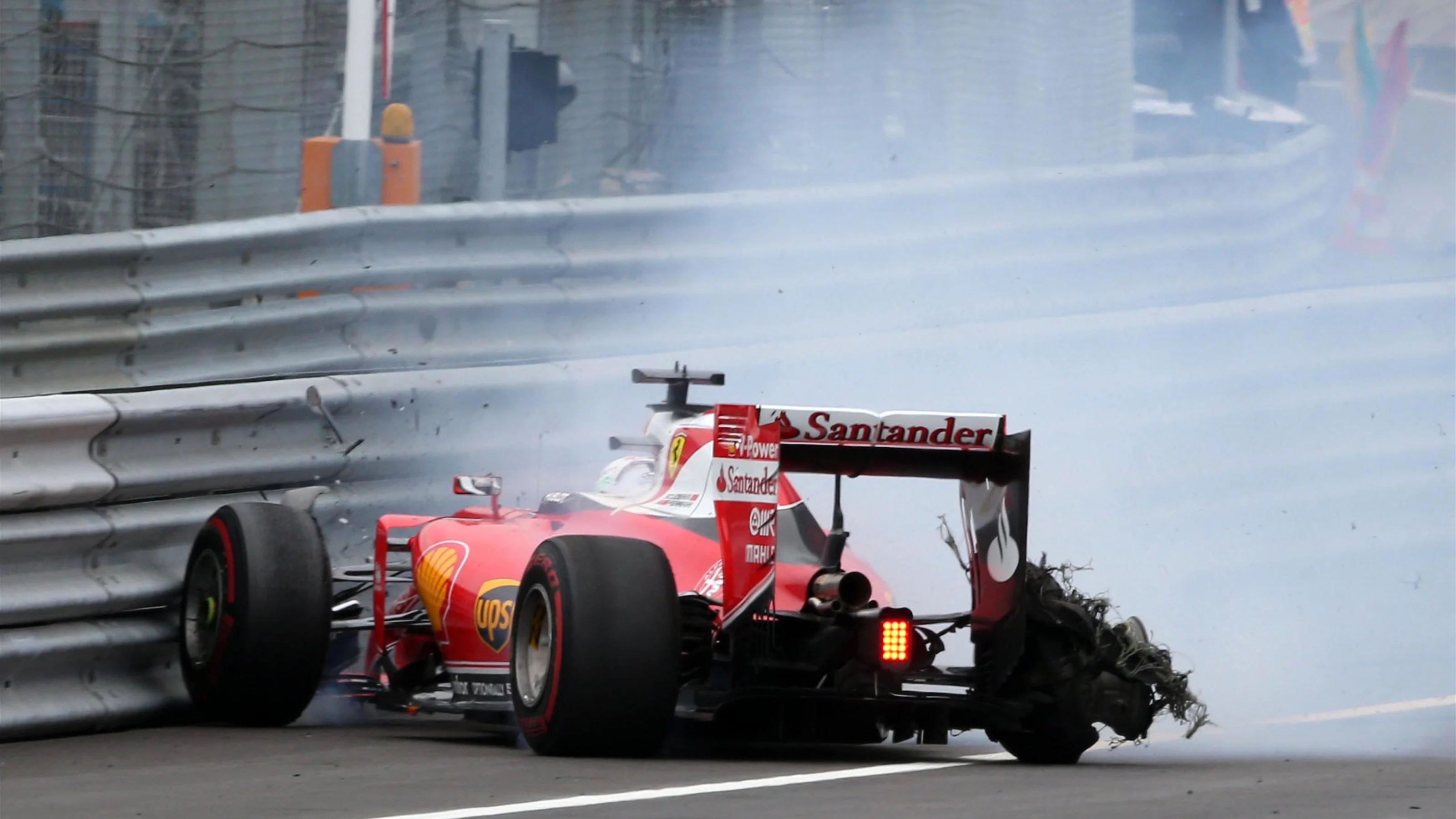 Sebastian Vettel (GER) Ferrari SF16-H crashes out of the race with a blown rear tyre at Formula One