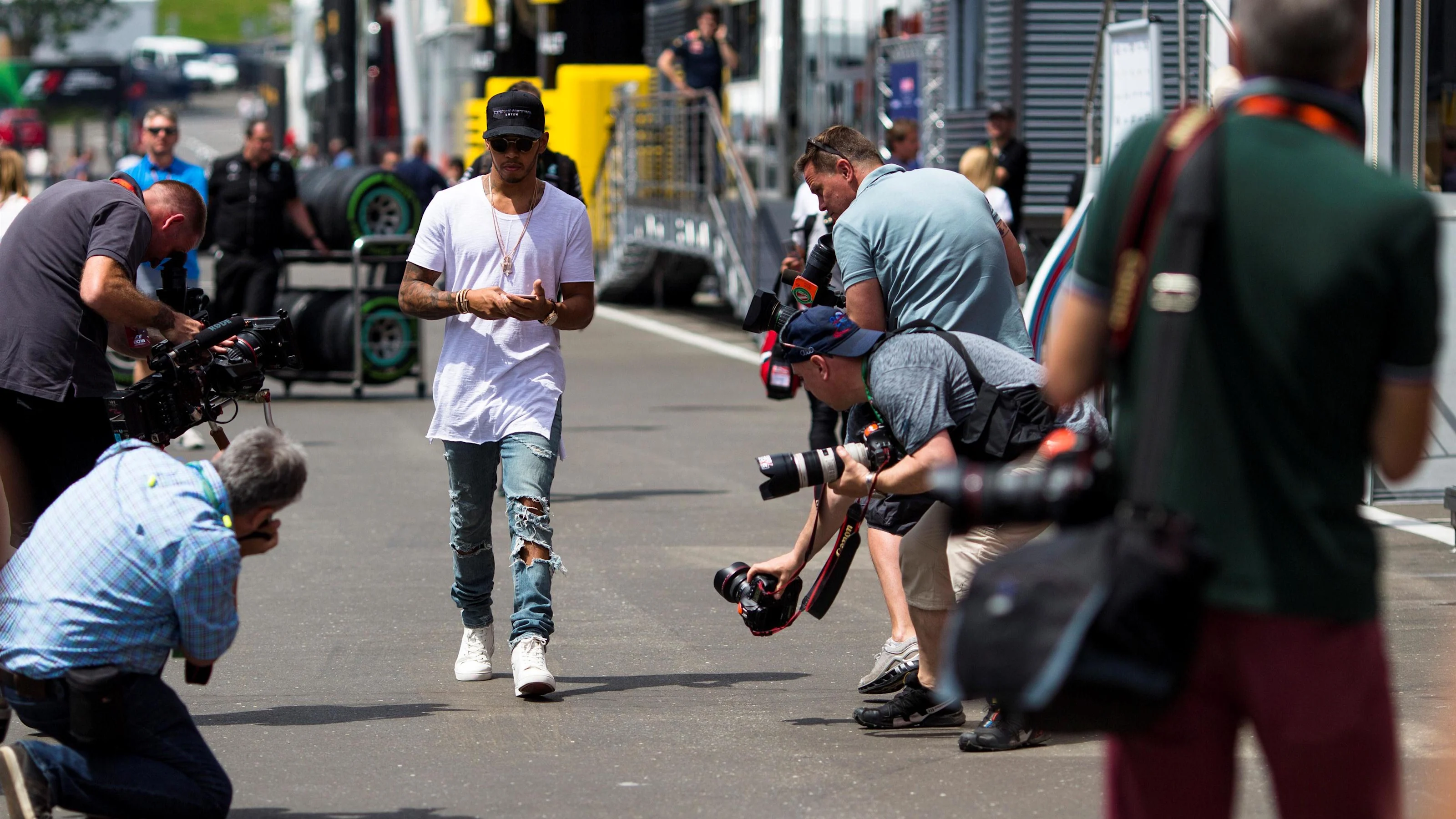 Lewis Hamilton (GBR) Mercedes AMG F1 and photographers at Formula One World Championship, Rd9,
